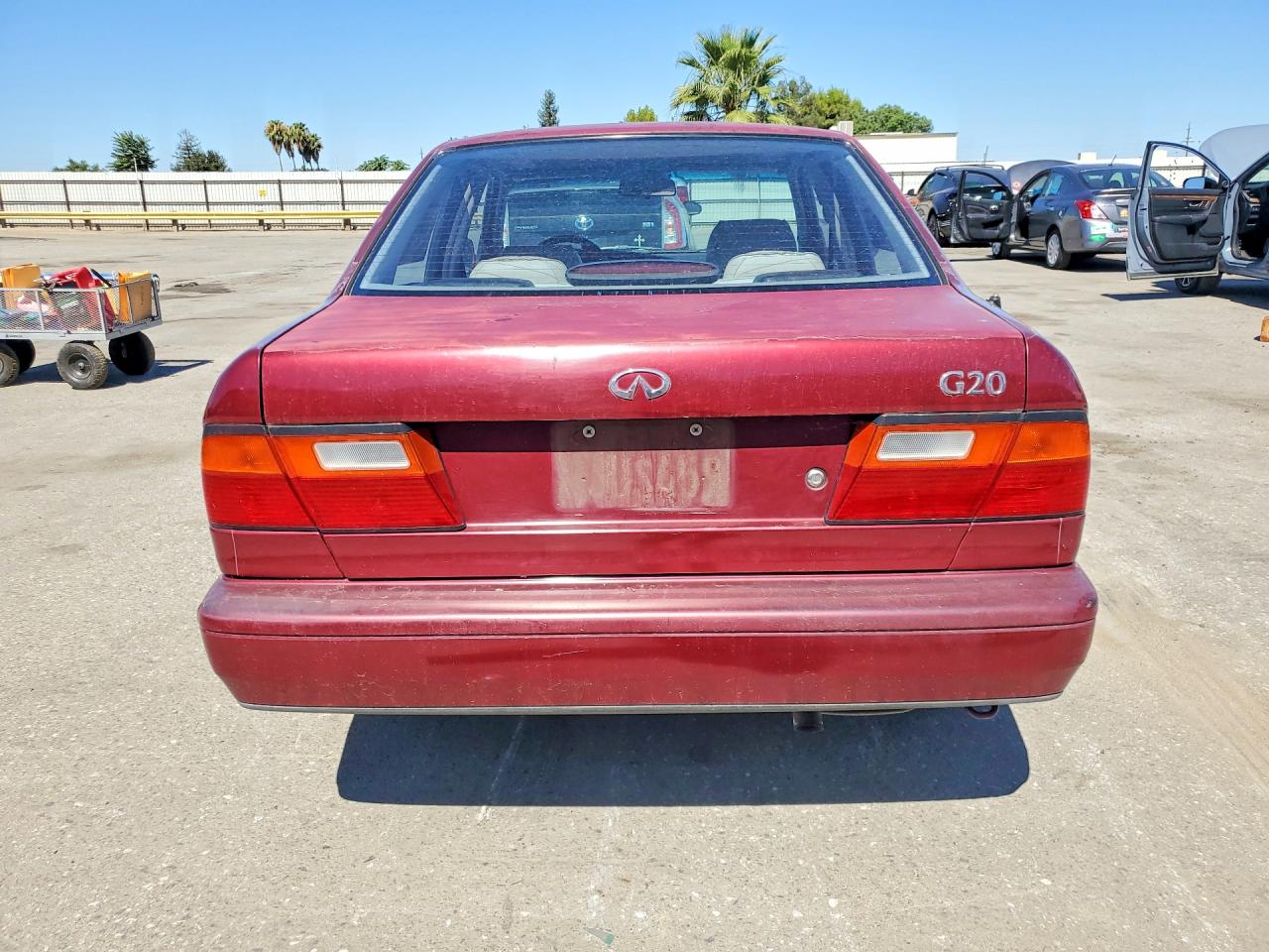 1994 Infiniti G20 Base Red vin: JNKCP01D6RT501365