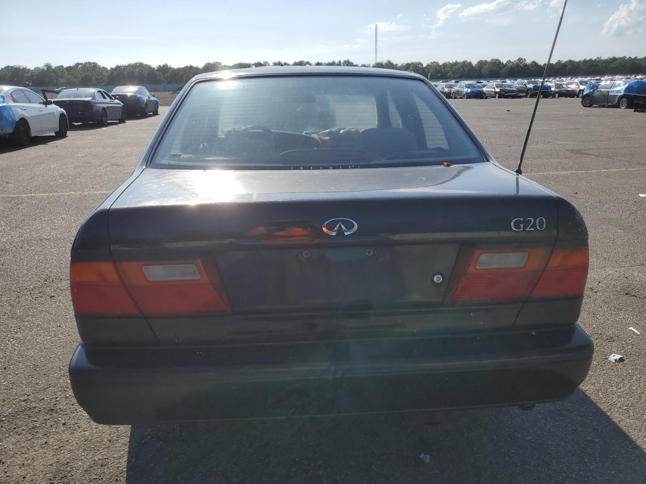 1995 Infiniti G20    Black vin: JNKCP01D9ST515315