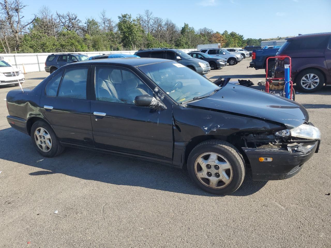 1995 Infiniti G20    Black vin: JNKCP01D9ST515315