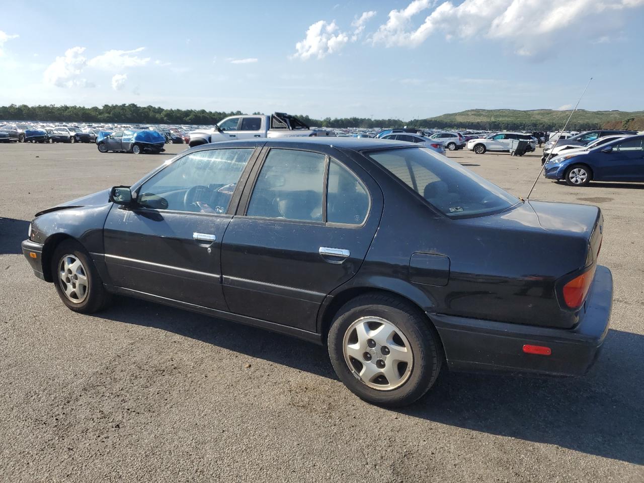 1995 Infiniti G20    Black vin: JNKCP01D9ST515315