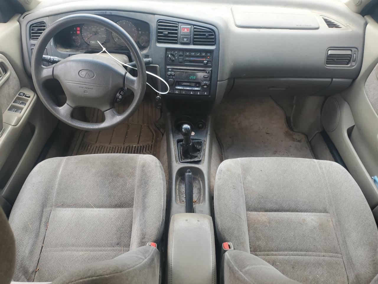 1999 Infiniti G20    Gold vin: JNKCP11A0XT009374