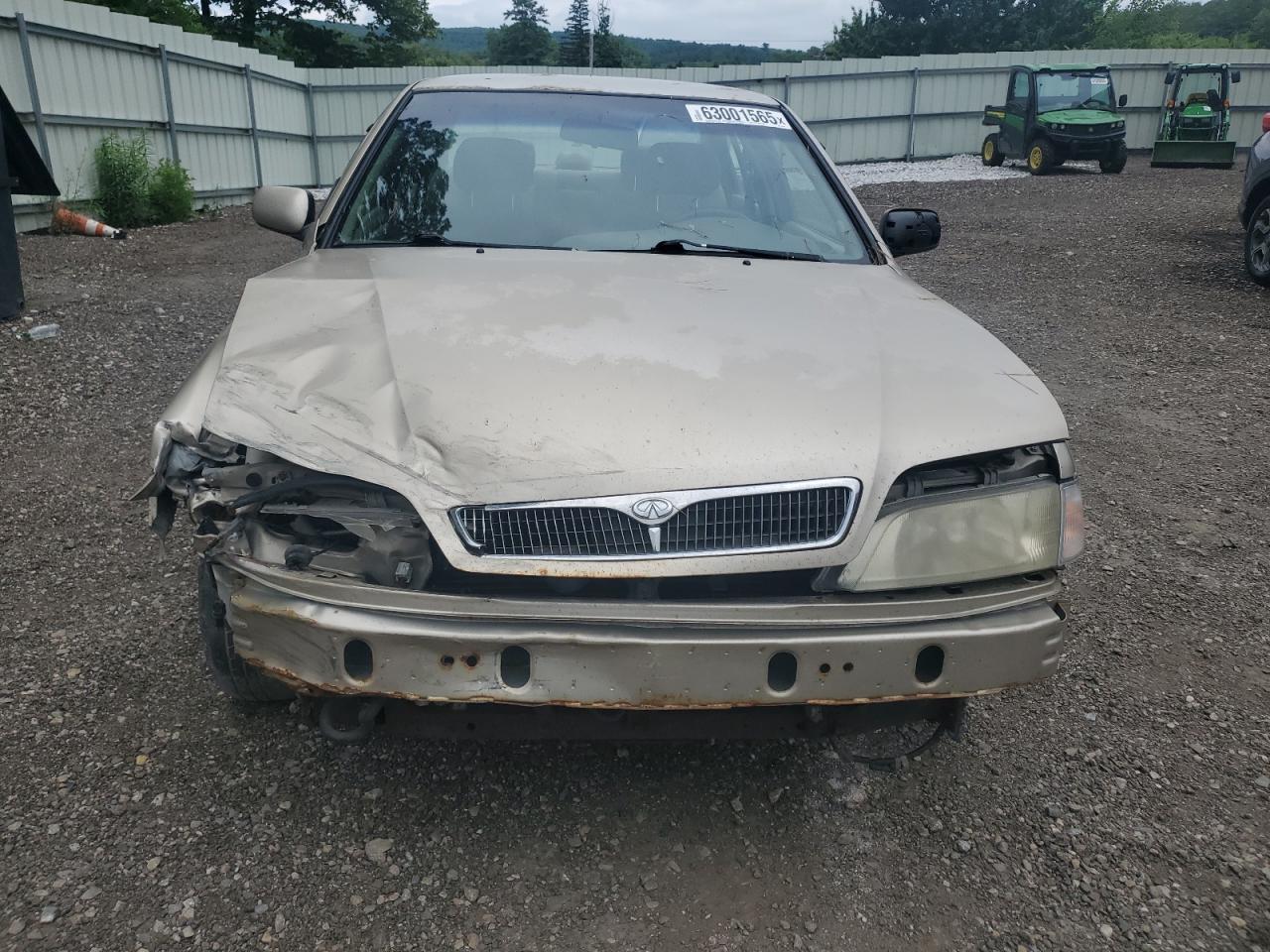 1999 Infiniti G20    Gold vin: JNKCP11A0XT009374