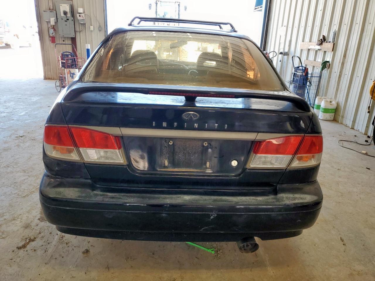 1999 Infiniti G20    Black vin: JNKCP11A6XT012859