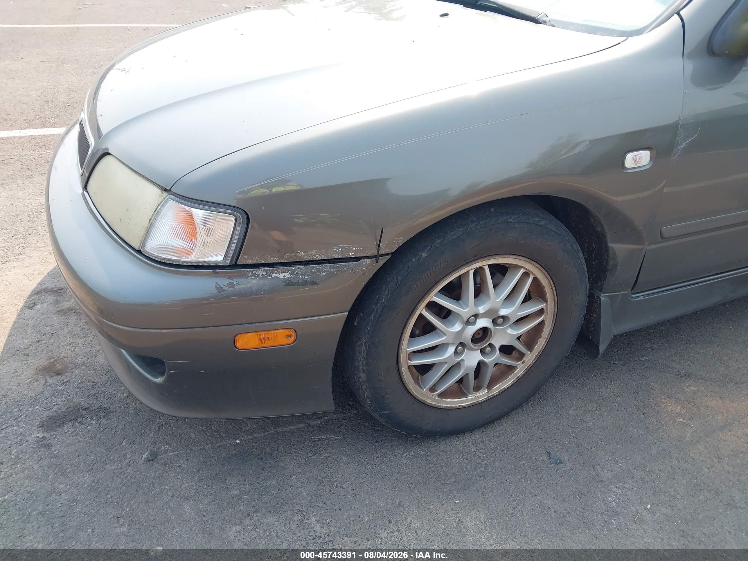 2001 Infiniti G20 Luxury Brown vin: JNKCP11A71T406667