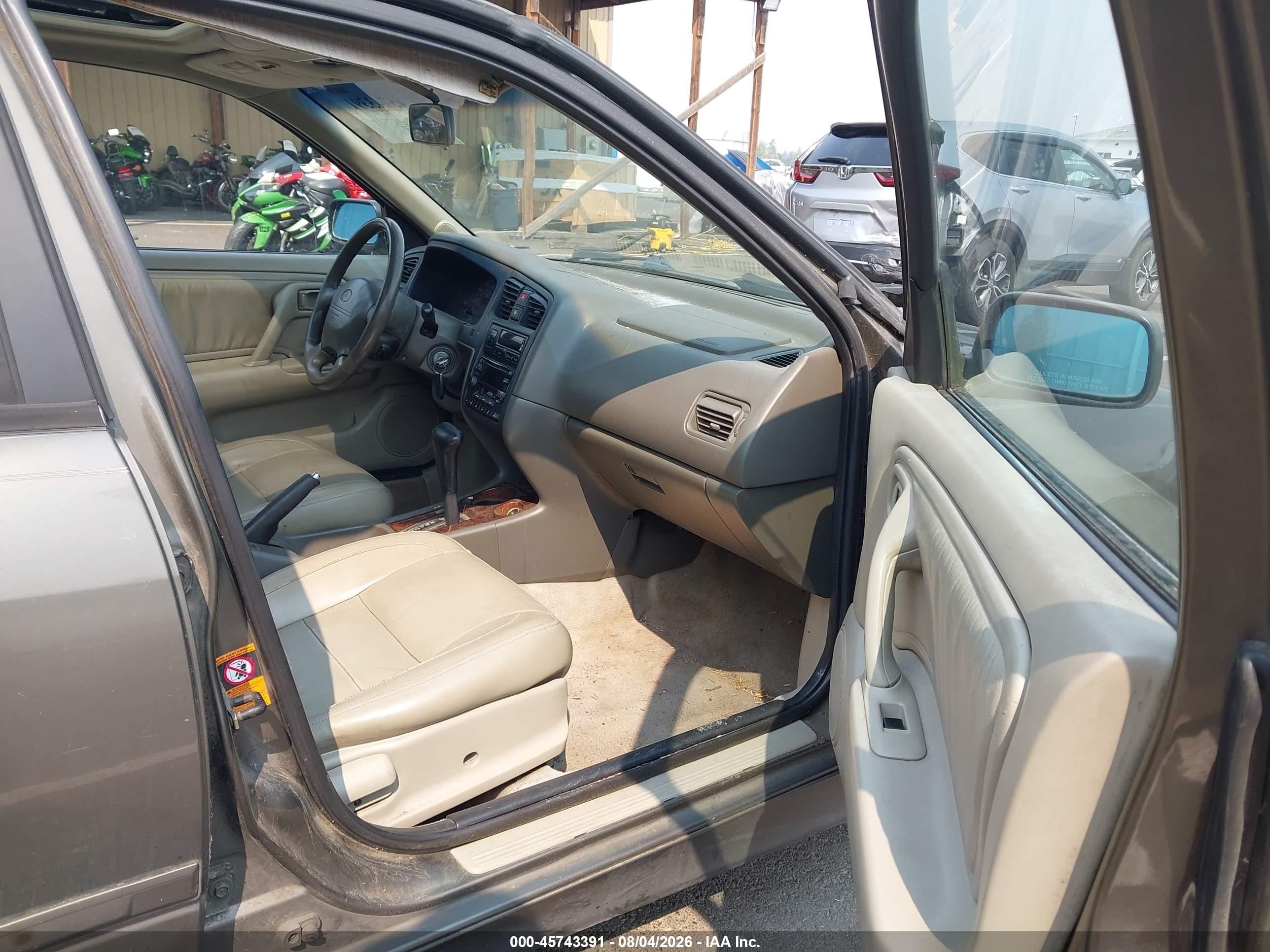 2001 Infiniti G20 Luxury Brown vin: JNKCP11A71T406667
