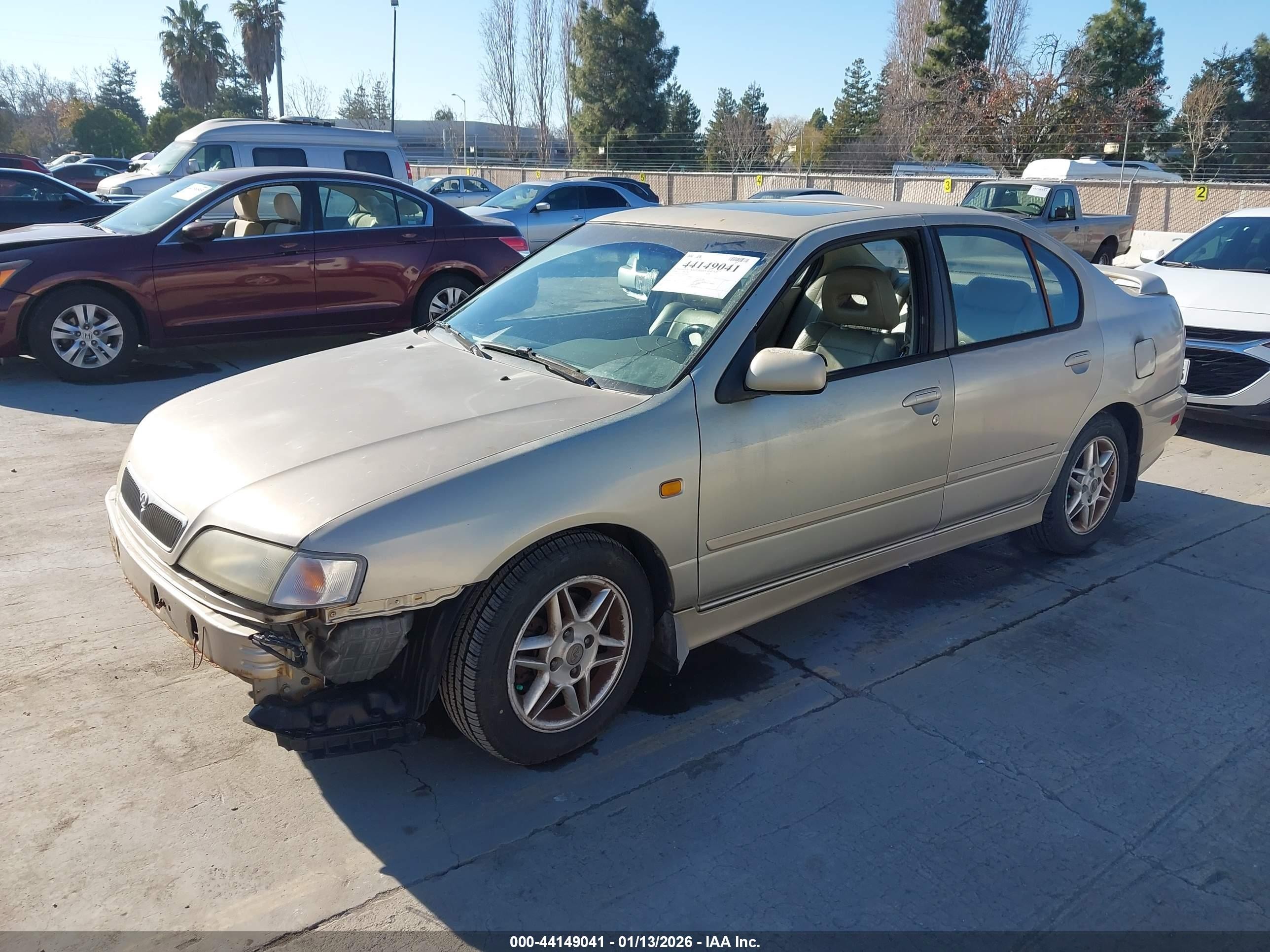 1999 Infiniti G20 Standard/touring Gold vin: JNKCP11A7XT016032