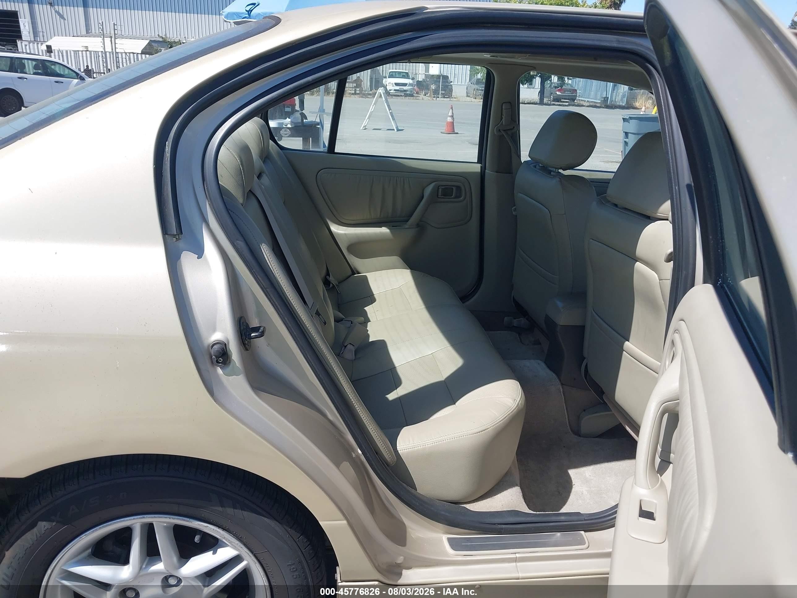 2002 Infiniti G20 Luxury Brown vin: JNKCP11A82T502289