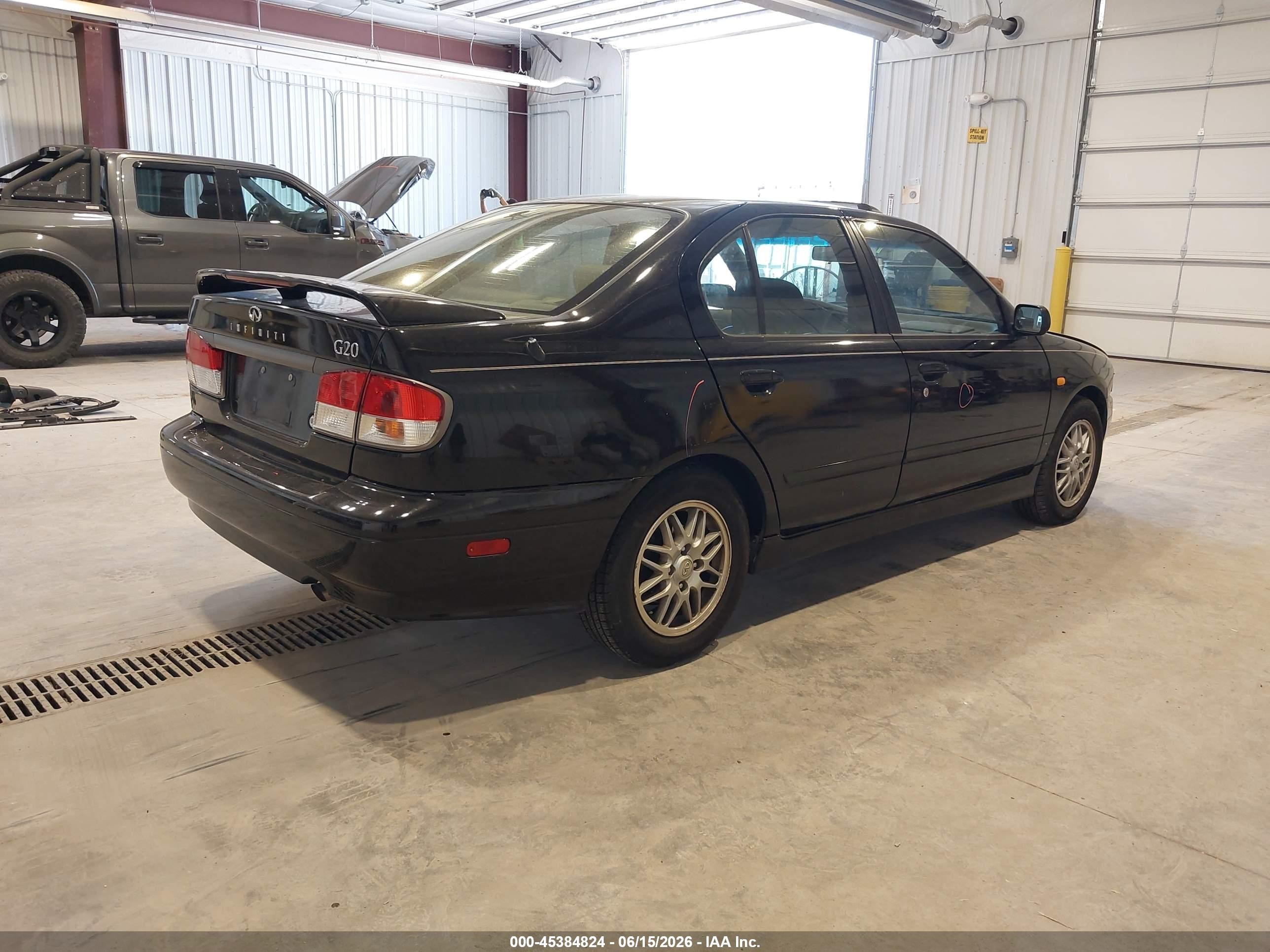 1999 Infiniti G20 Standard/touring Черный vin: JNKCP11A8XT018162