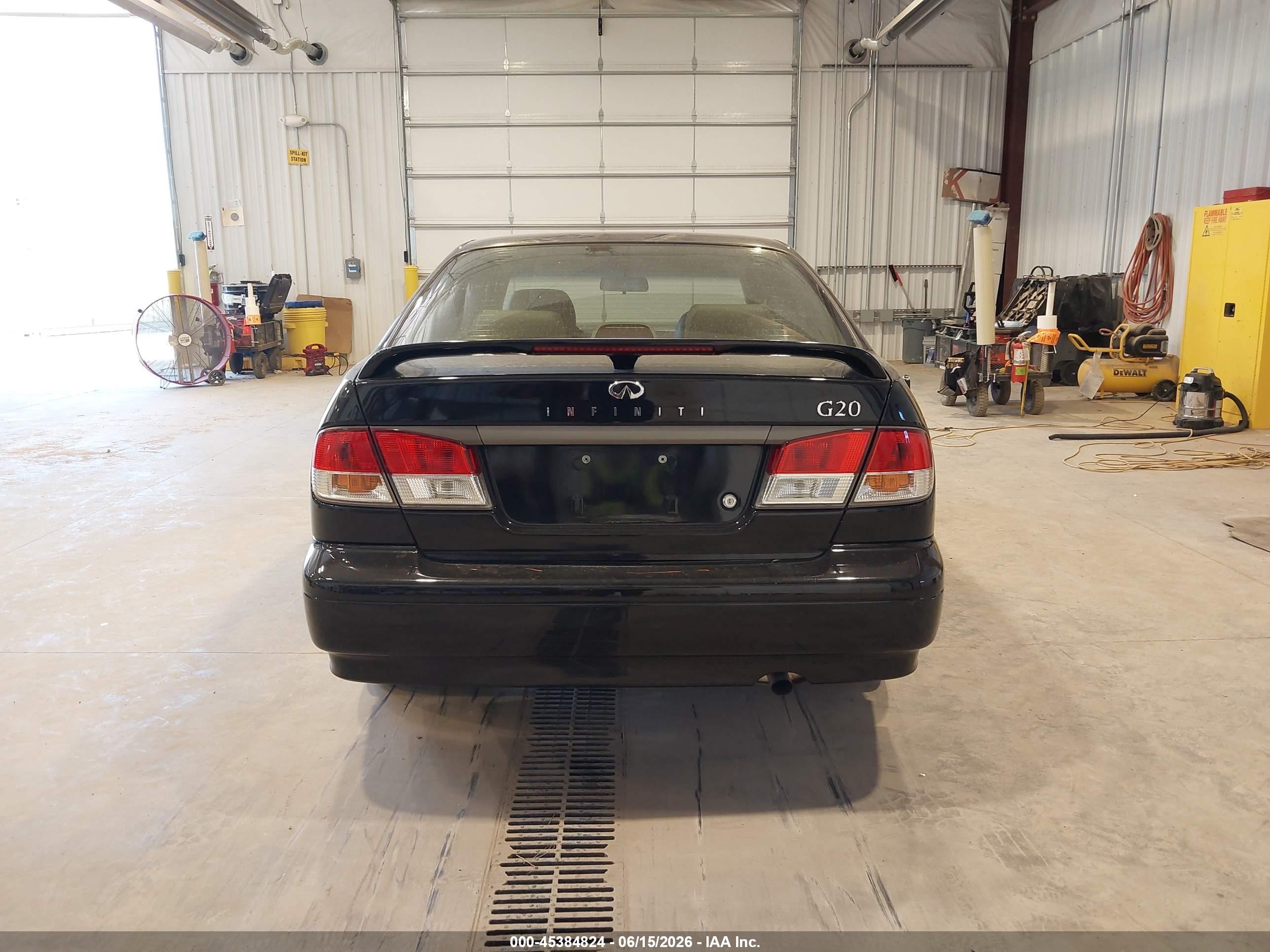 1999 Infiniti G20 Standard/touring Черный vin: JNKCP11A8XT018162