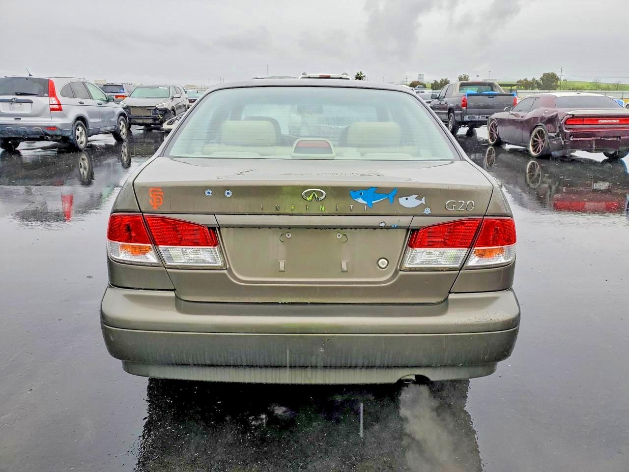 1999 Infiniti G20 Коричневый vin: JNKCP11A8XT019344