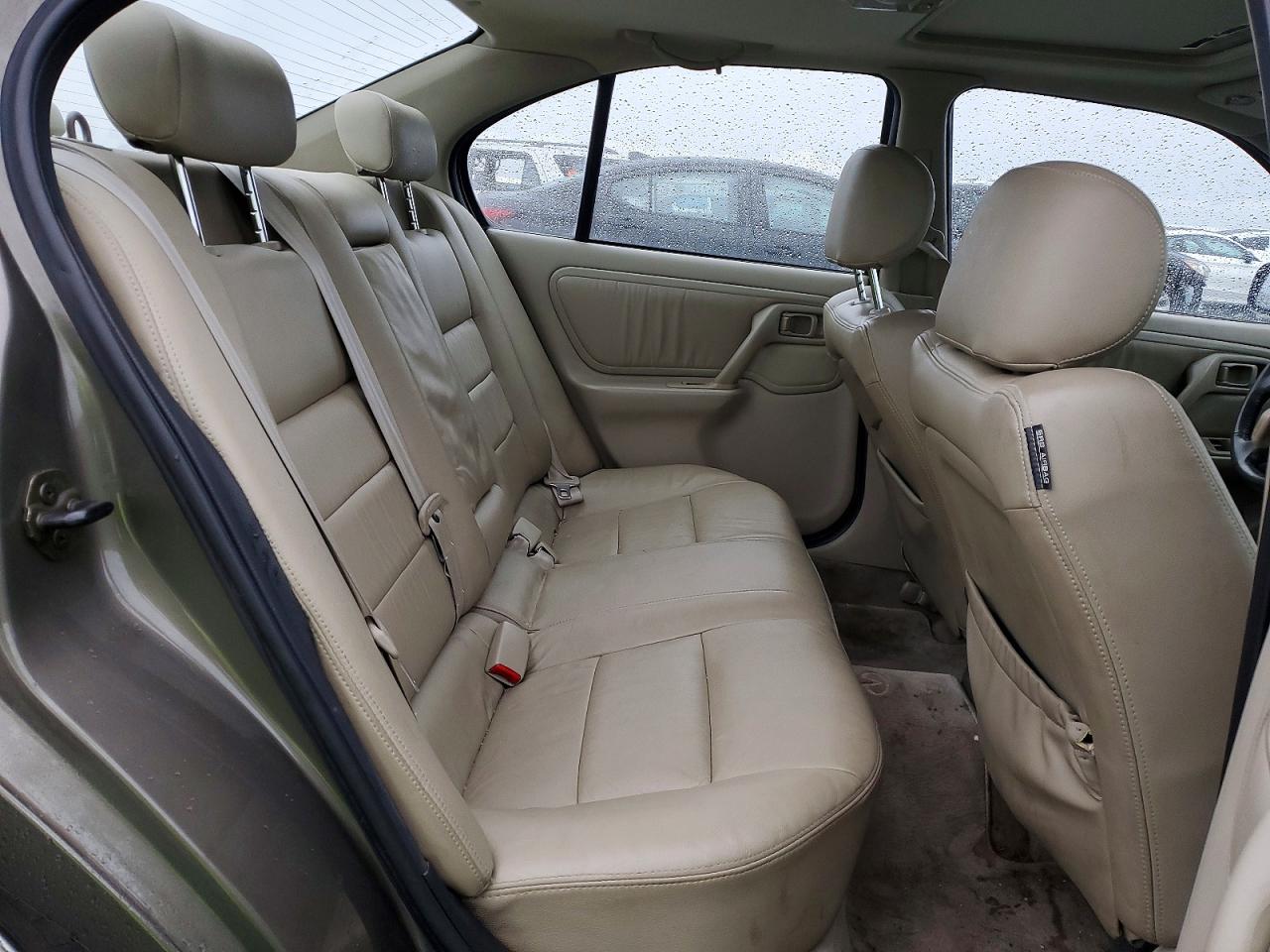 1999 Infiniti G20 Коричневый vin: JNKCP11A8XT019344
