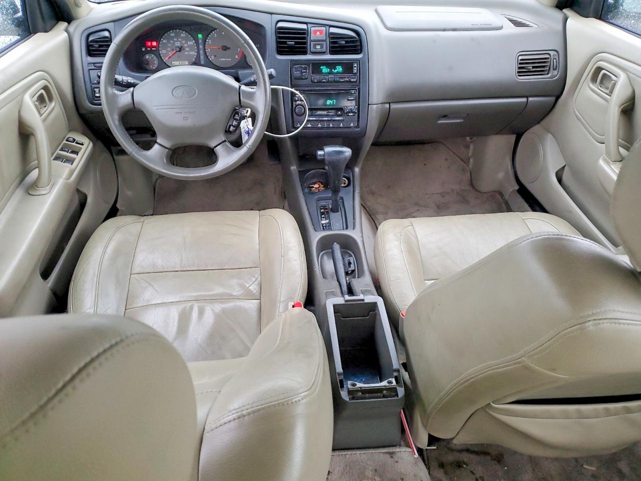 1999 Infiniti G20 Коричневый vin: JNKCP11A8XT019344