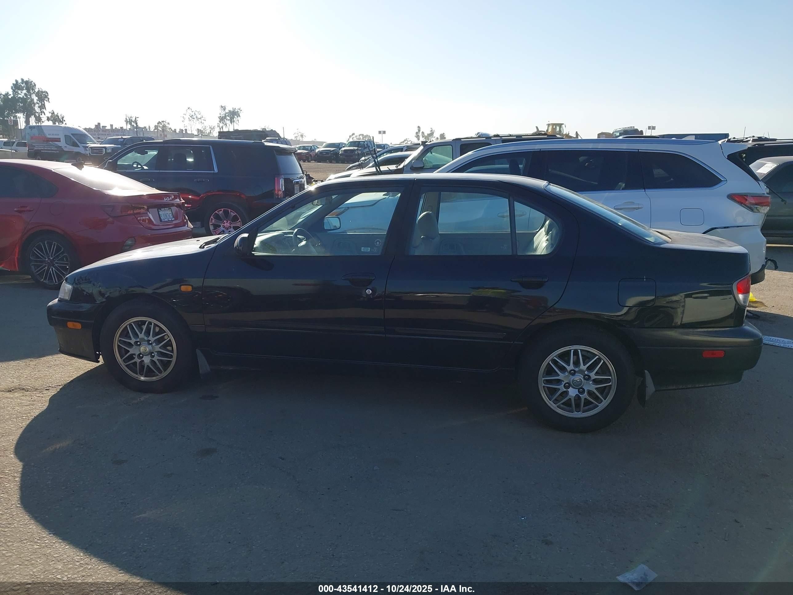 1999 Infiniti G20 Standard/touring Black vin: JNKCP11A8XT019974