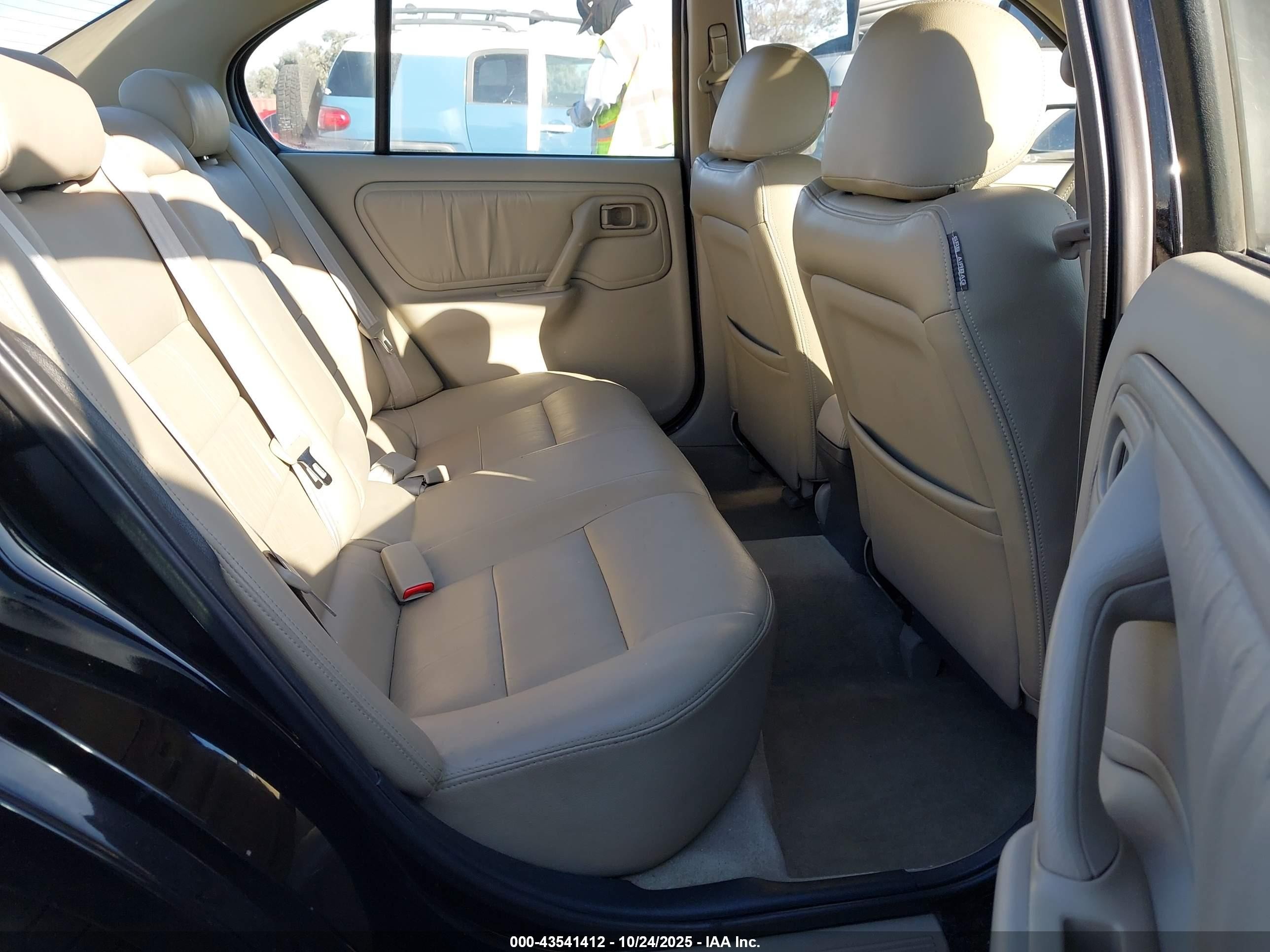 1999 Infiniti G20 Standard/touring Black vin: JNKCP11A8XT019974