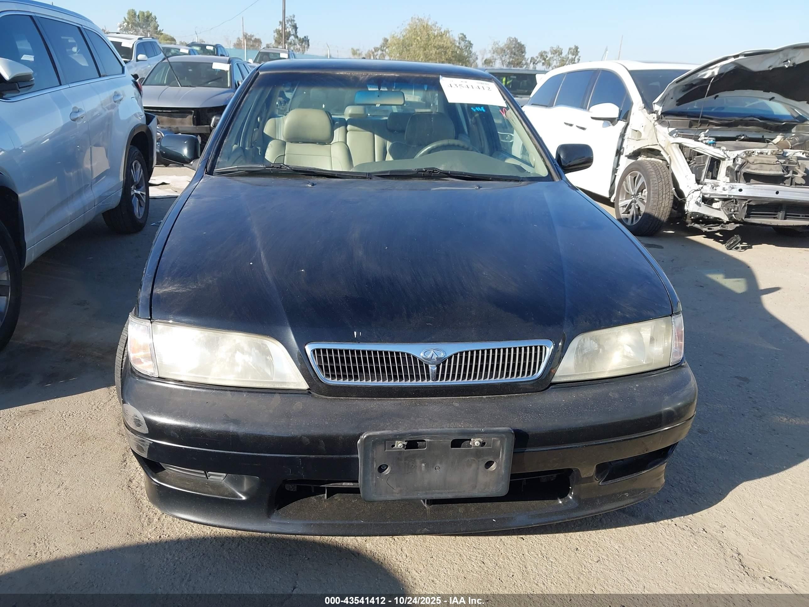 1999 Infiniti G20 Standard/touring Black vin: JNKCP11A8XT019974