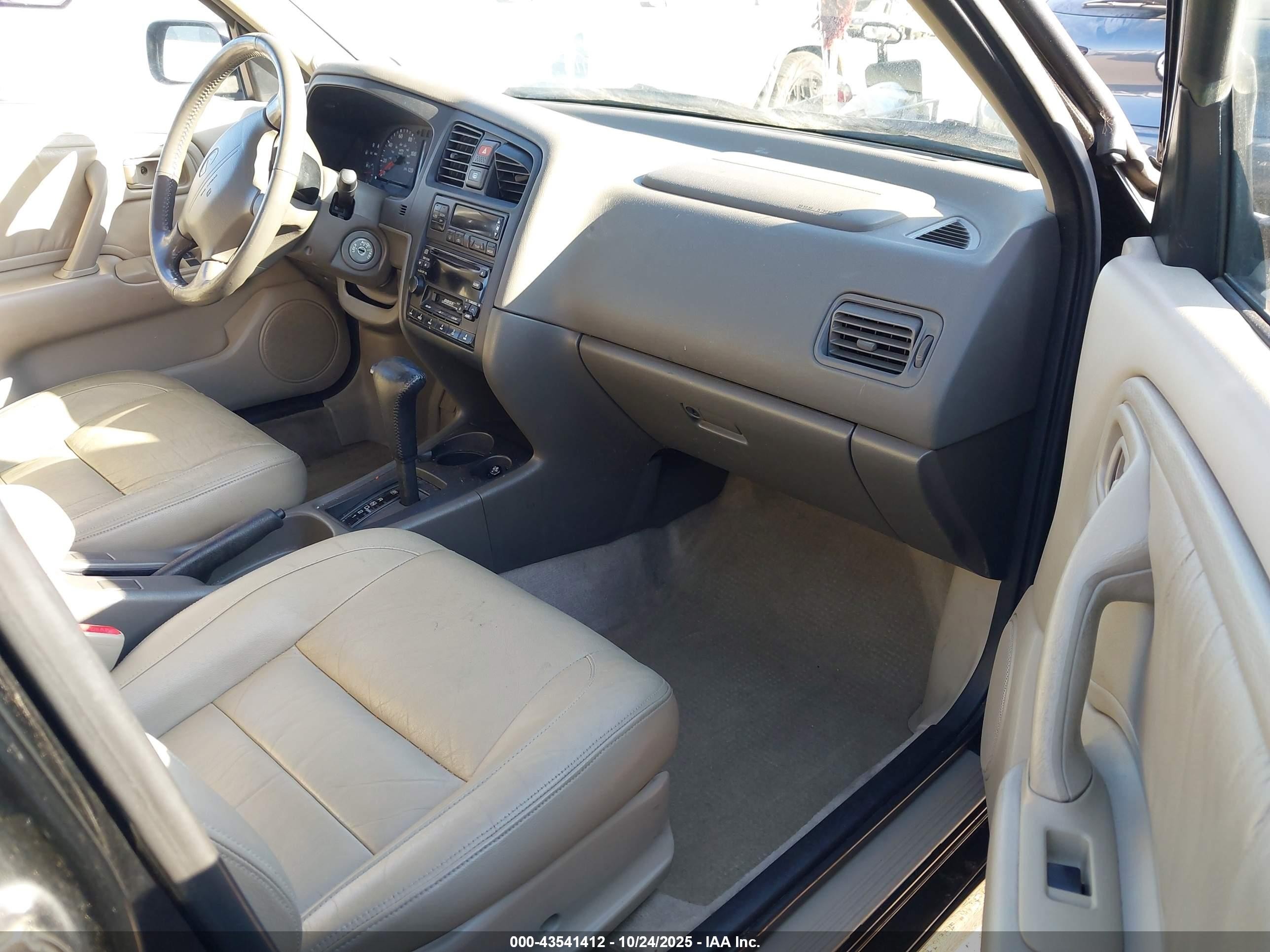 1999 Infiniti G20 Standard/touring Black vin: JNKCP11A8XT019974