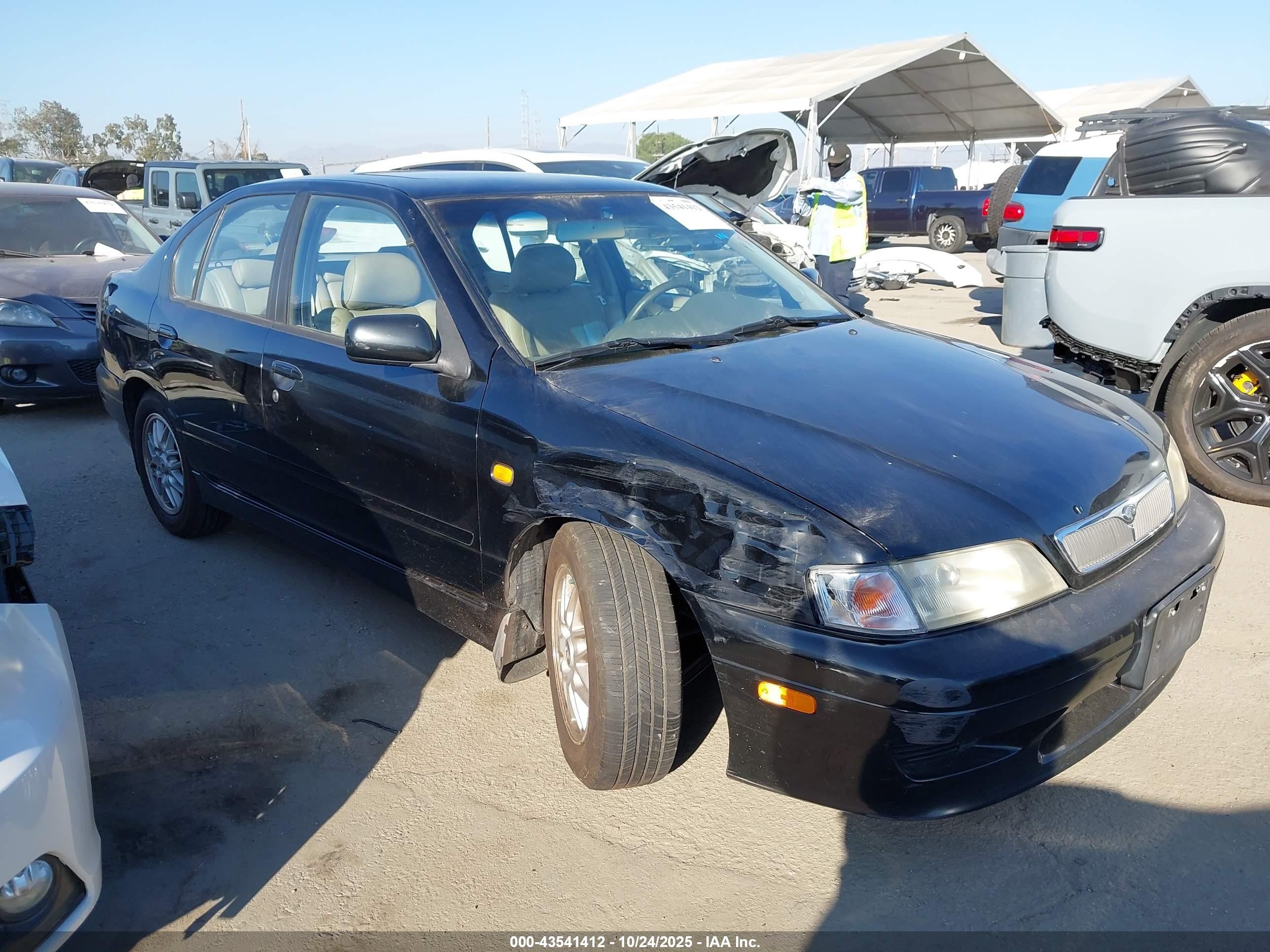 1999 Infiniti G20 Standard/touring Black vin: JNKCP11A8XT019974