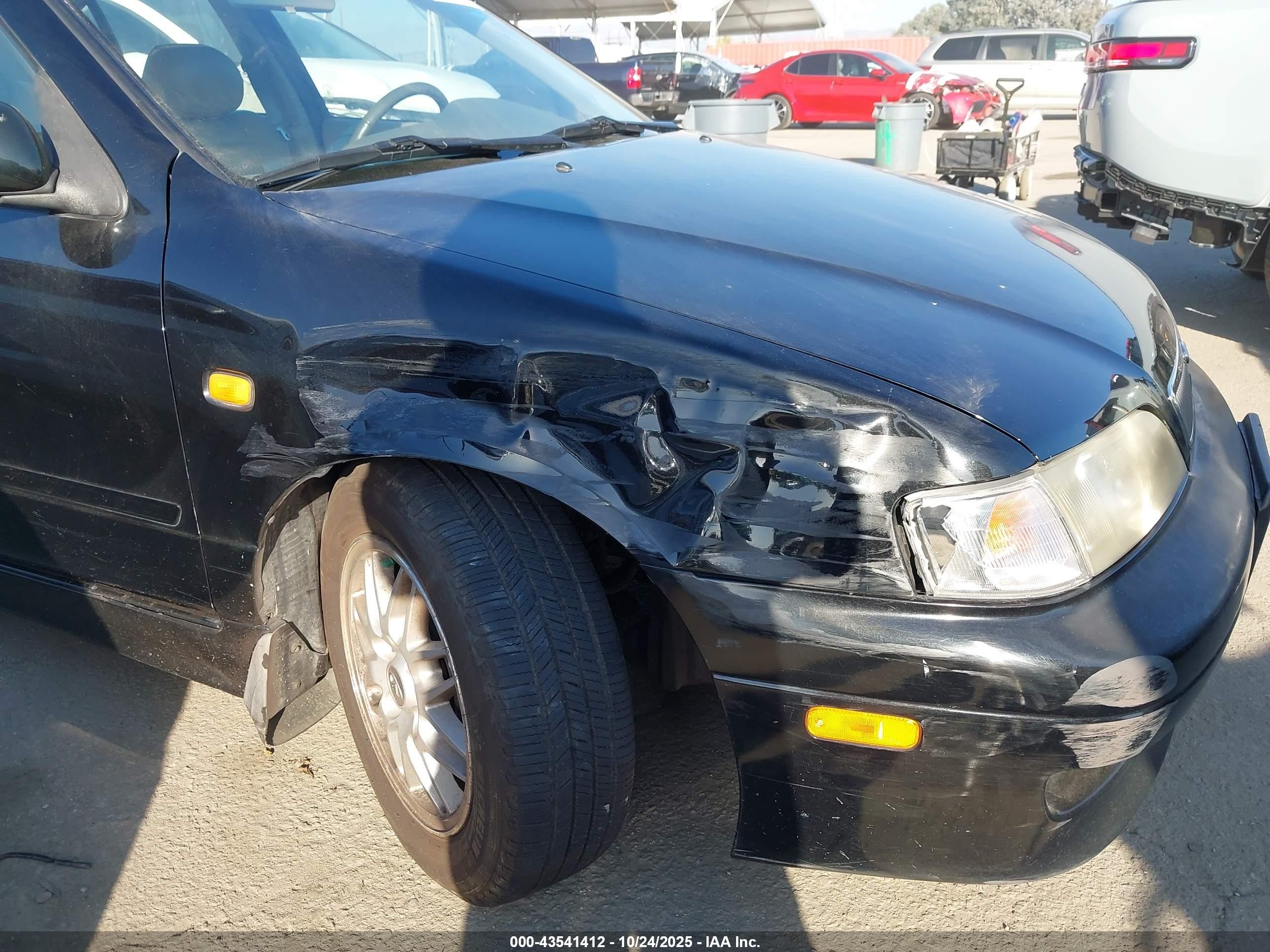 1999 Infiniti G20 Standard/touring Black vin: JNKCP11A8XT019974