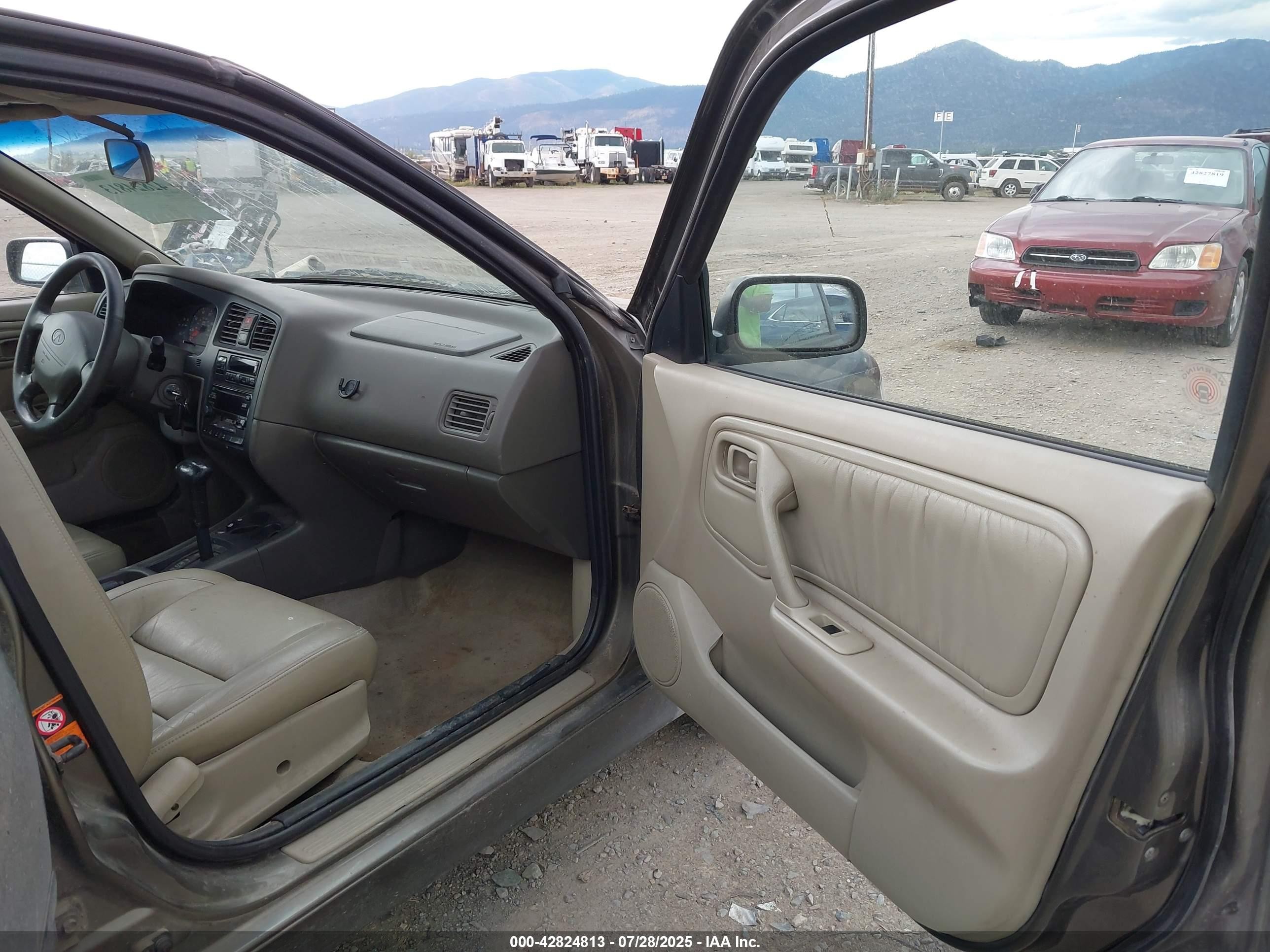1999 Infiniti G20 Standard/touring Dark Brown vin: JNKCP11A9XT000513