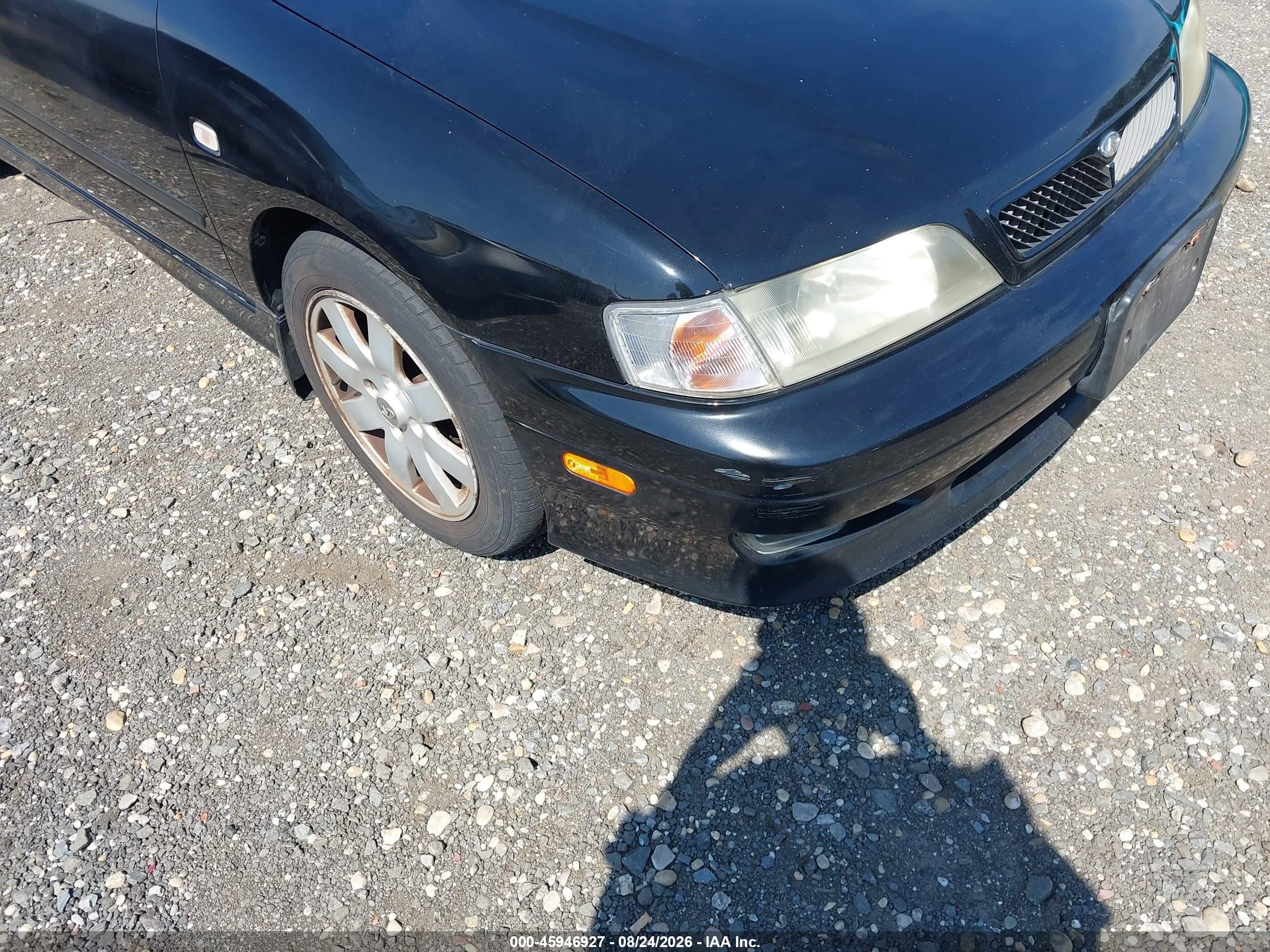 2002 Infiniti G20 Luxury Черный vin: JNKCP11AX2T504769