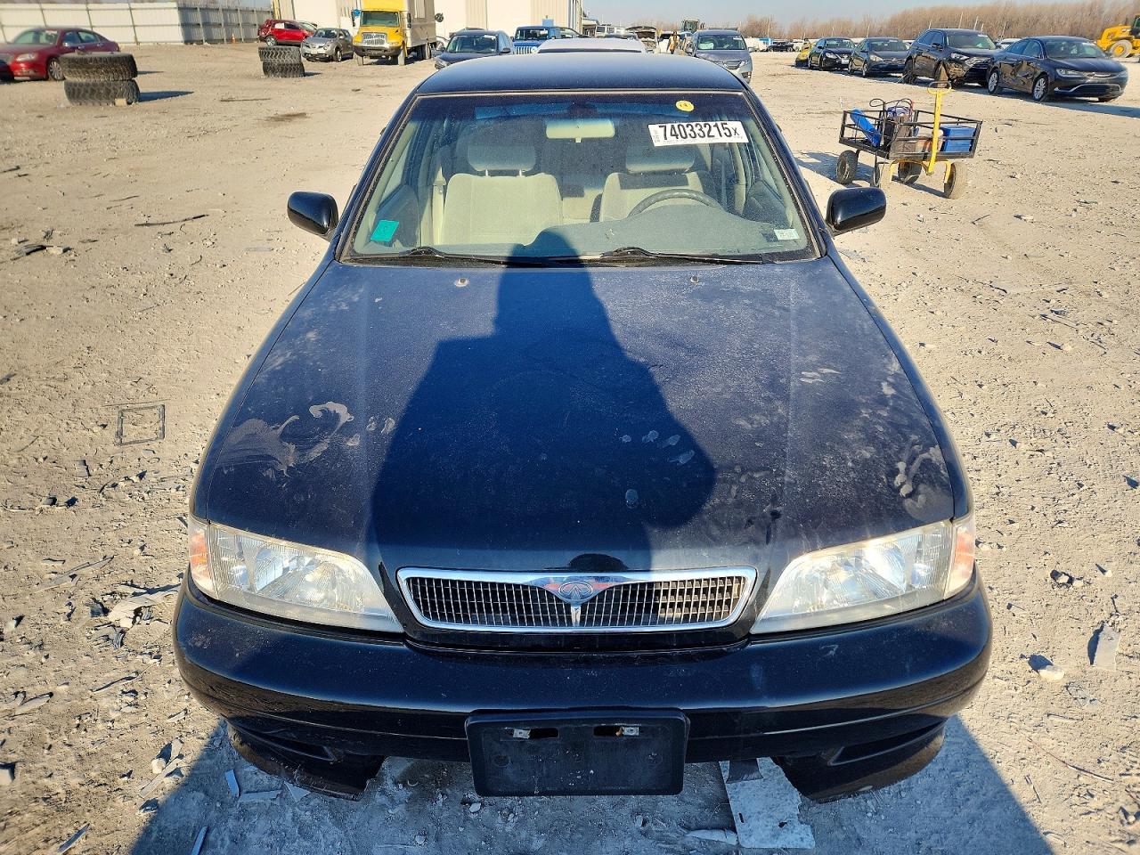 1999 Infiniti G20 Black vin: JNKCP11AXXT021144