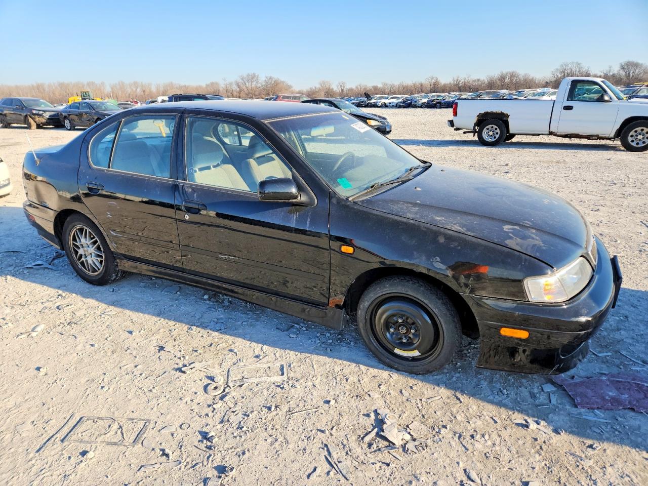 1999 Infiniti G20 Black vin: JNKCP11AXXT021144