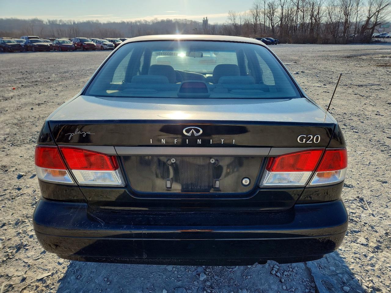 1999 Infiniti G20 Black vin: JNKCP11AXXT021144