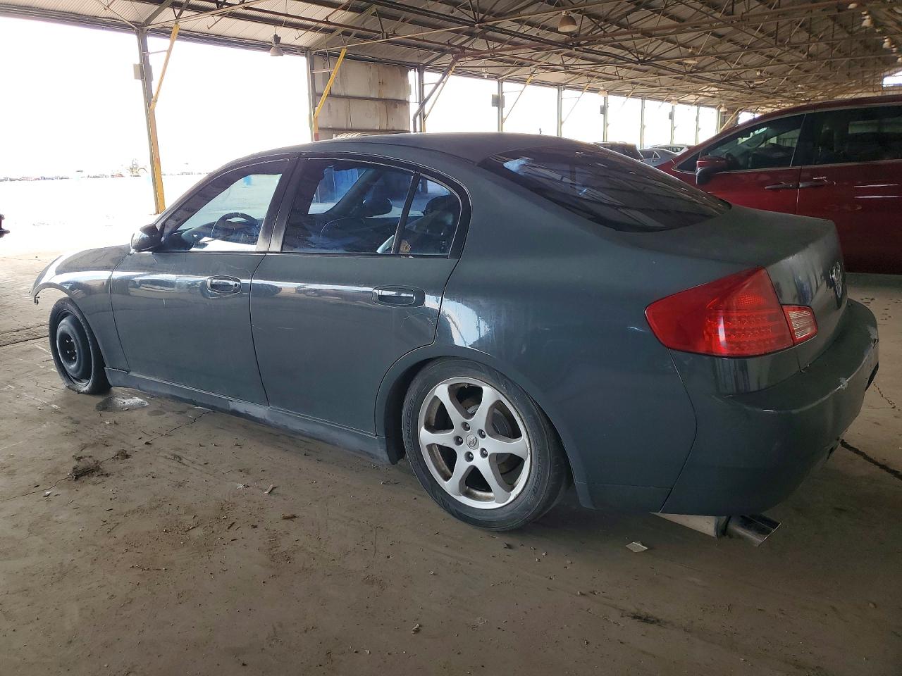 2003 Infiniti G35 Base Teal vin: JNKCV51E03M007239
