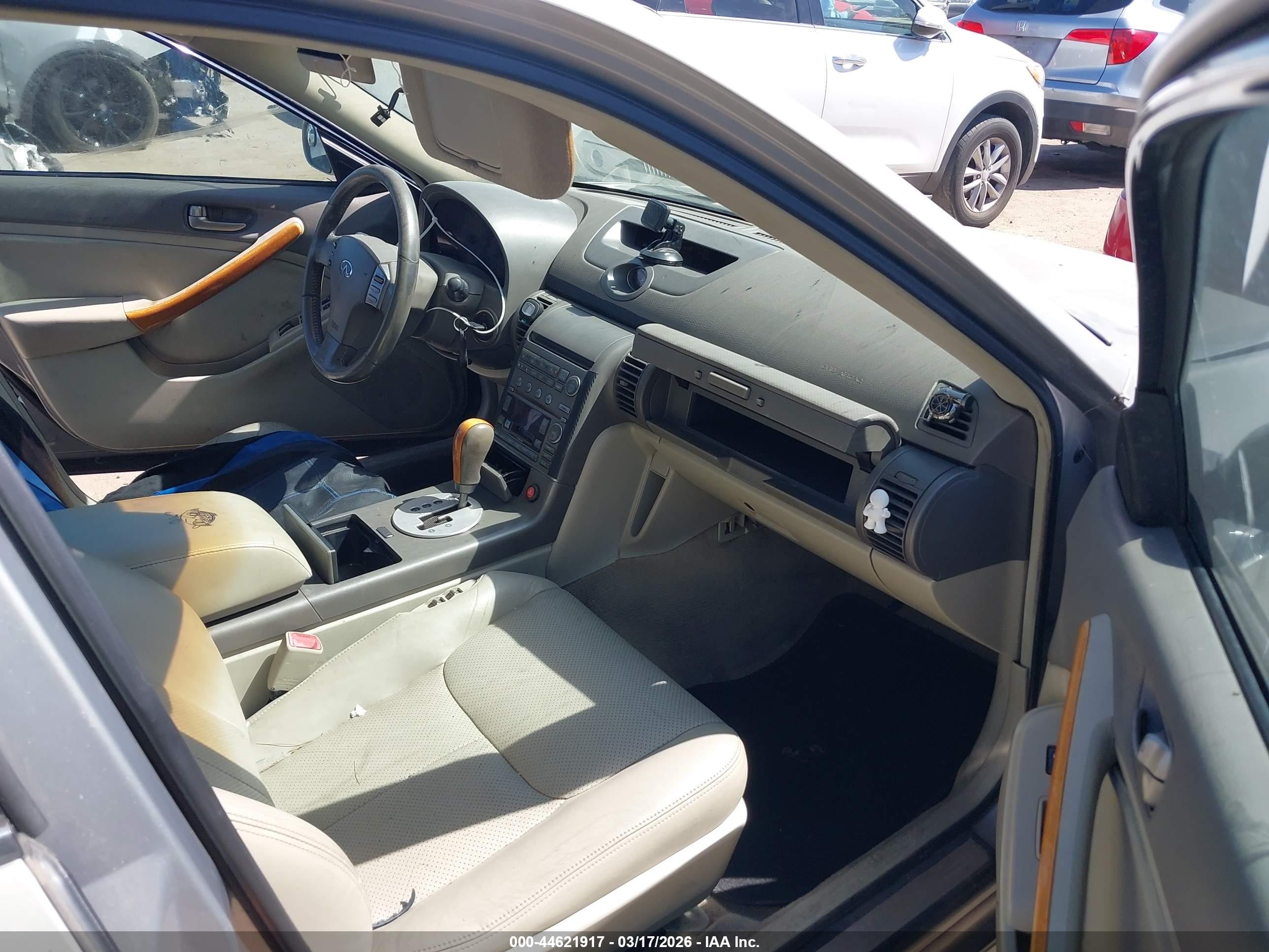 2003 Infiniti G35 Base W/6 Speed Manual Champagne vin: JNKCV51E33M018963