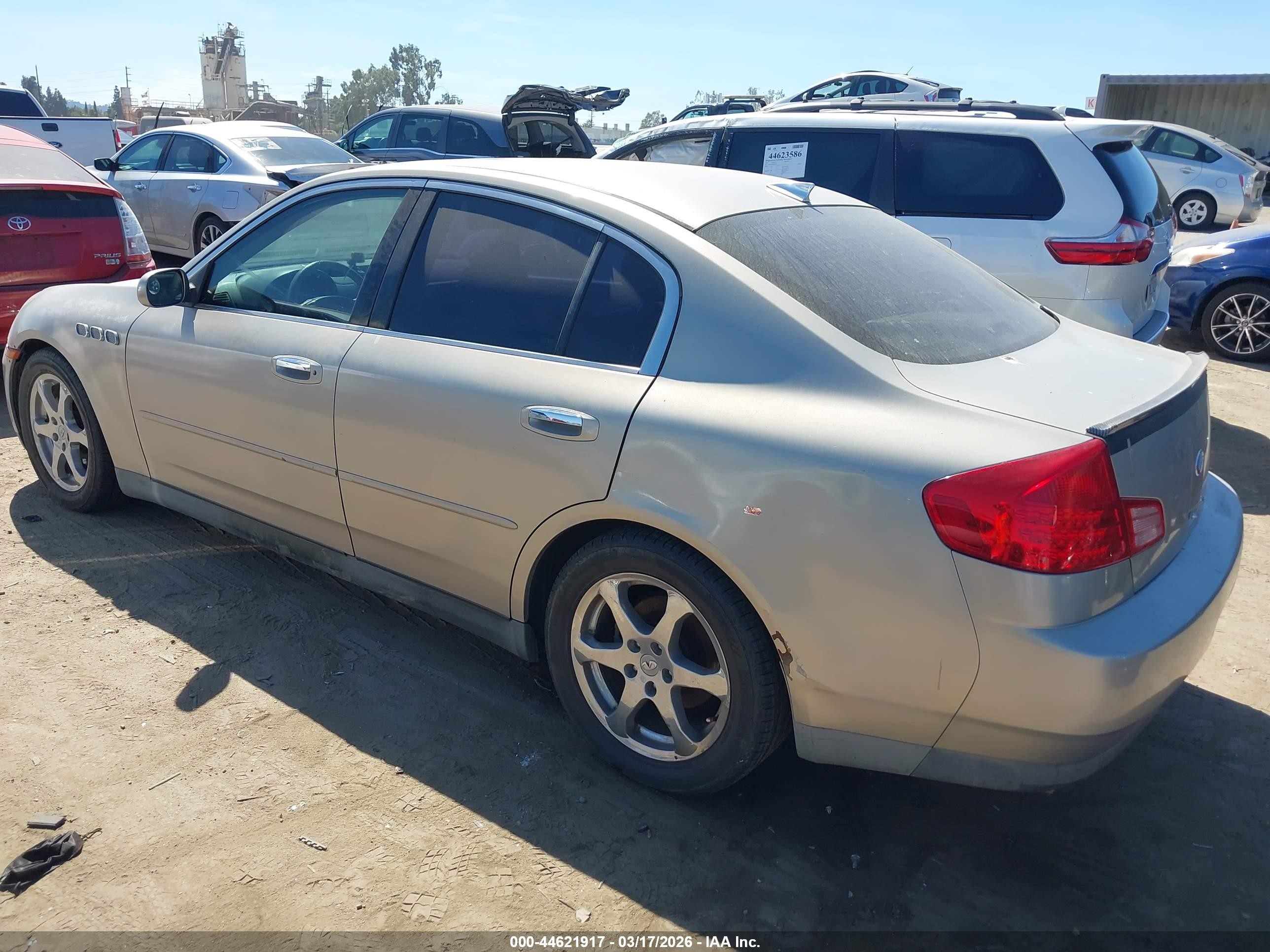 2003 Infiniti G35 Base W/6 Speed Manual Champagne vin: JNKCV51E33M018963