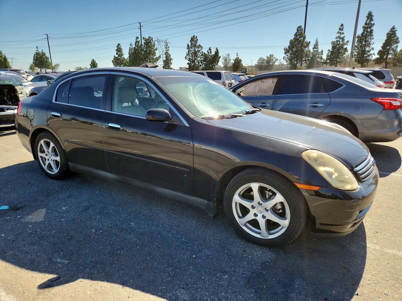 2004 Infiniti G35 Base Black vin: JNKCV51E34M111113