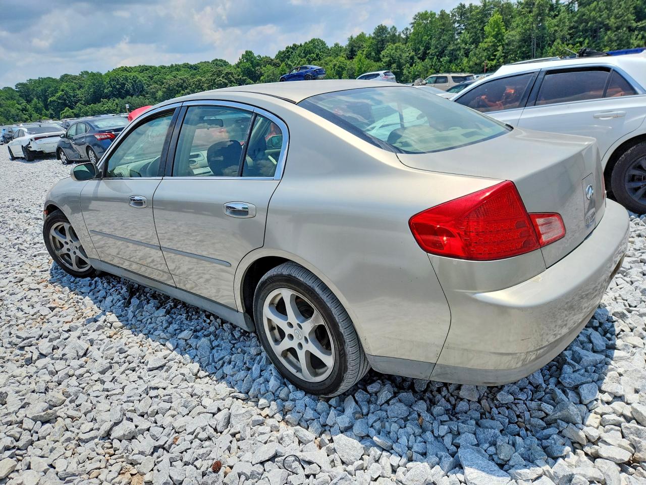 2003 Infiniti G35 Base Gold vin: JNKCV51E73M021879