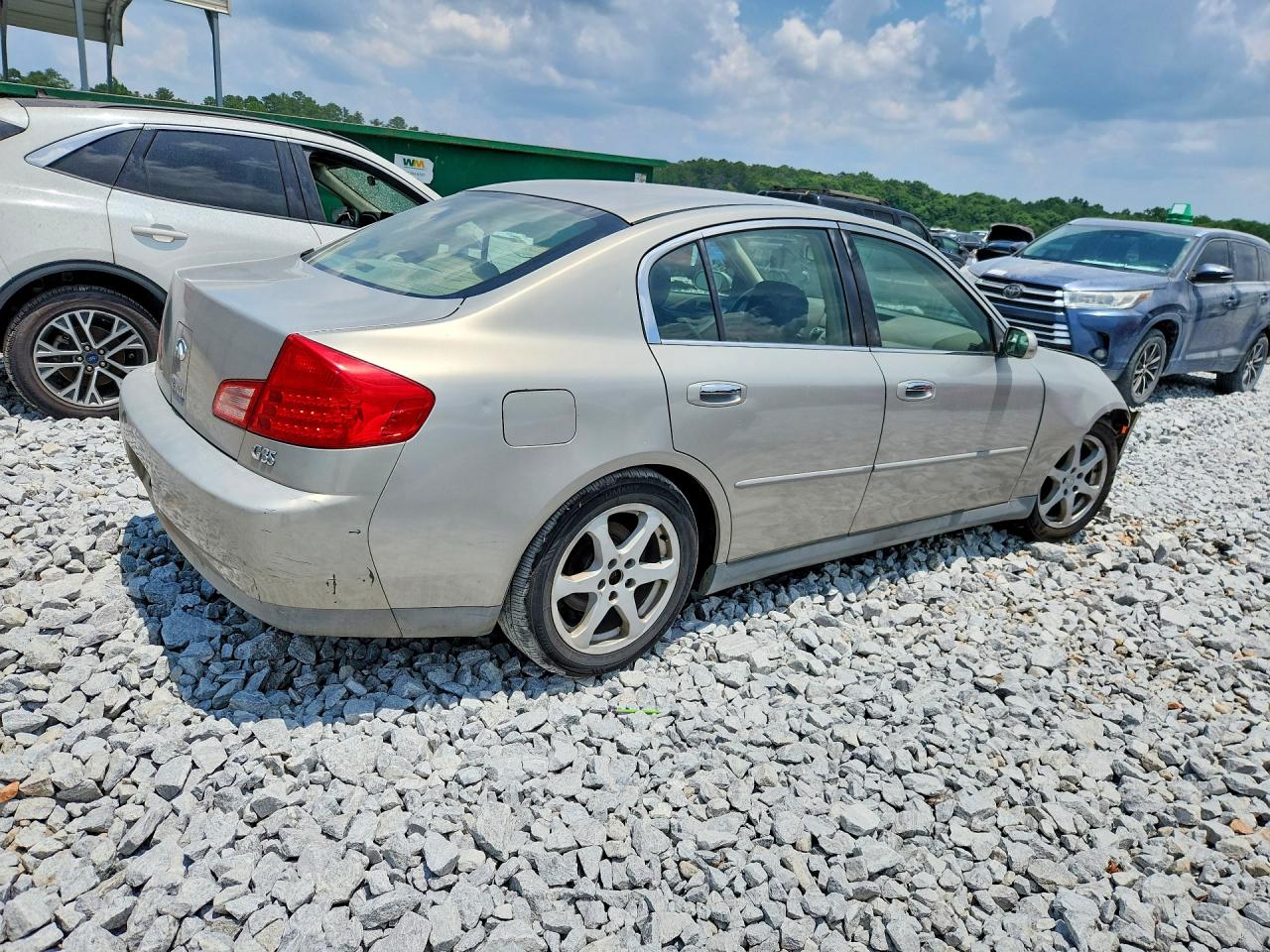 2003 Infiniti G35 Base Gold vin: JNKCV51E73M021879