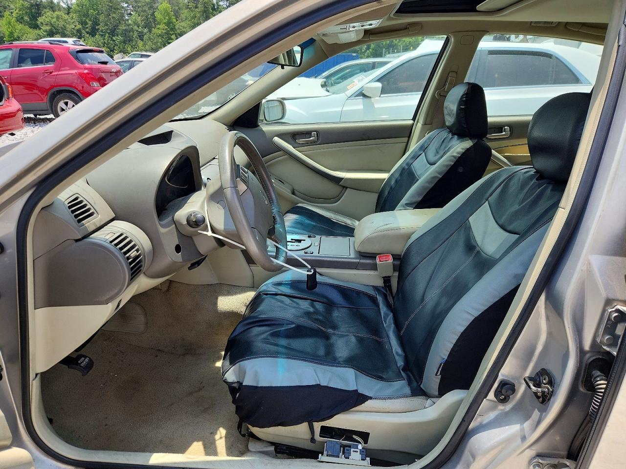 2003 Infiniti G35 Base Gold vin: JNKCV51E73M021879