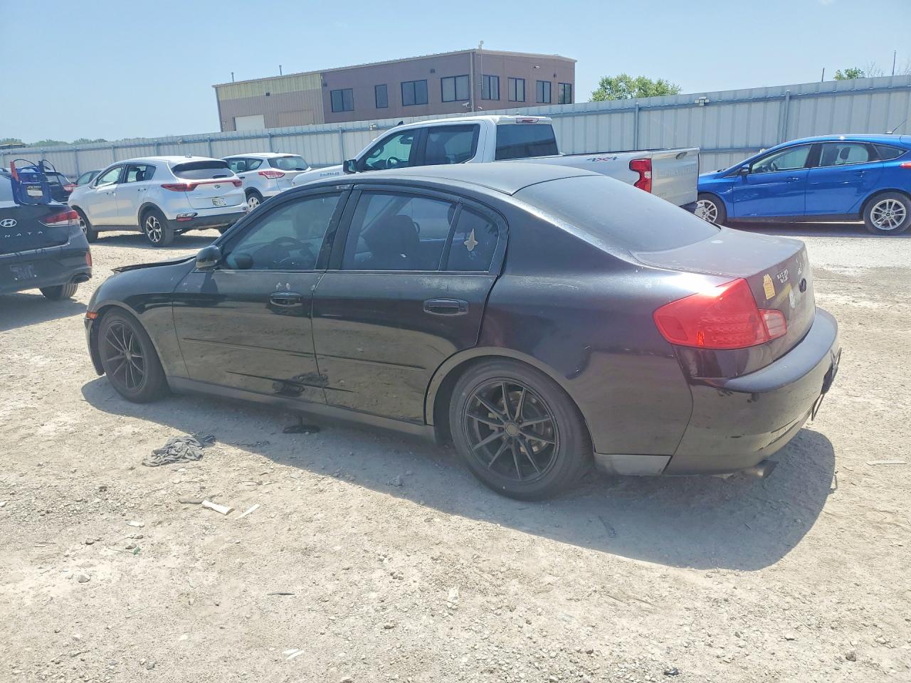 2004 Infiniti G35 Base Black vin: JNKCV51E94M606190