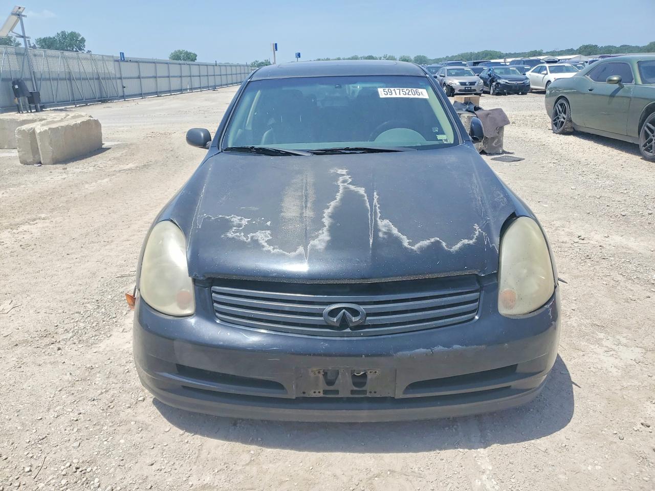 2004 Infiniti G35 Base Black vin: JNKCV51E94M606190