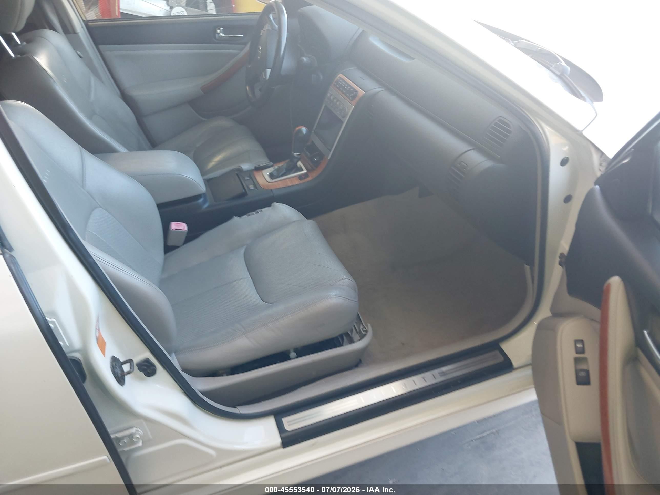 2006 Infiniti G35x   White vin: JNKCV51F06M605604