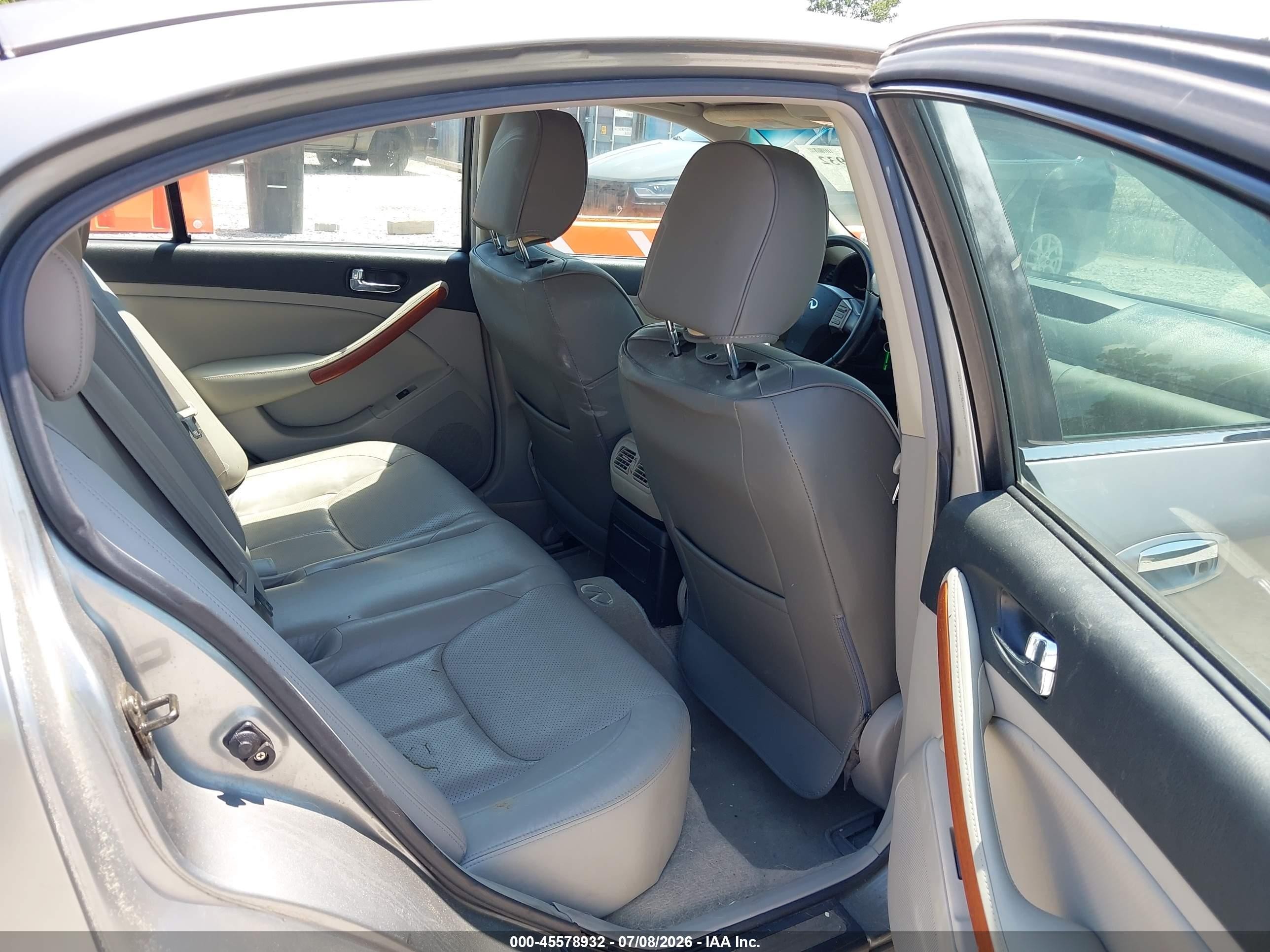 2005 Infiniti G35   Champagne vin: JNKCV51F15M311904
