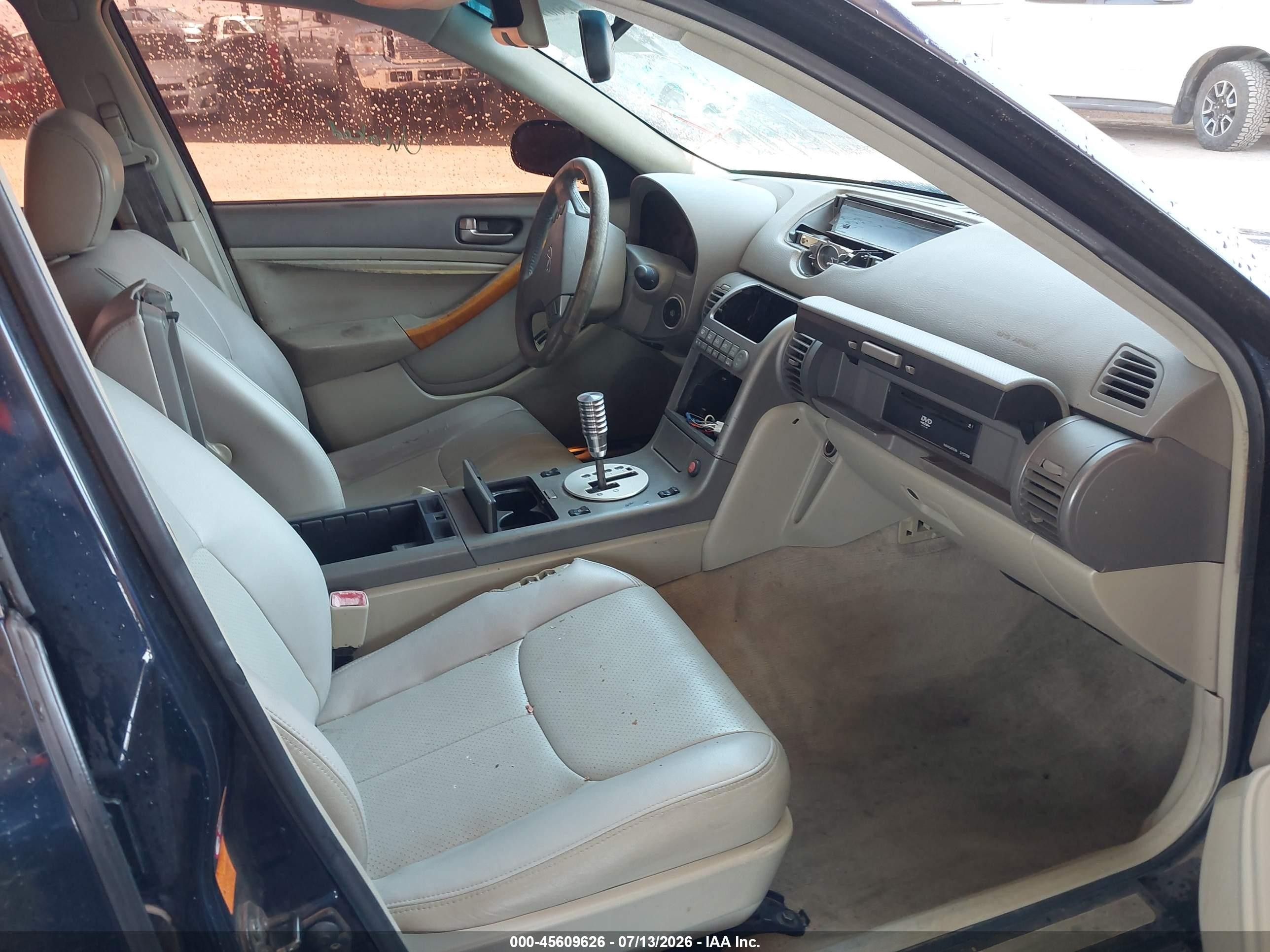 2004 Infiniti G35x   Blue vin: JNKCV51F64M700018