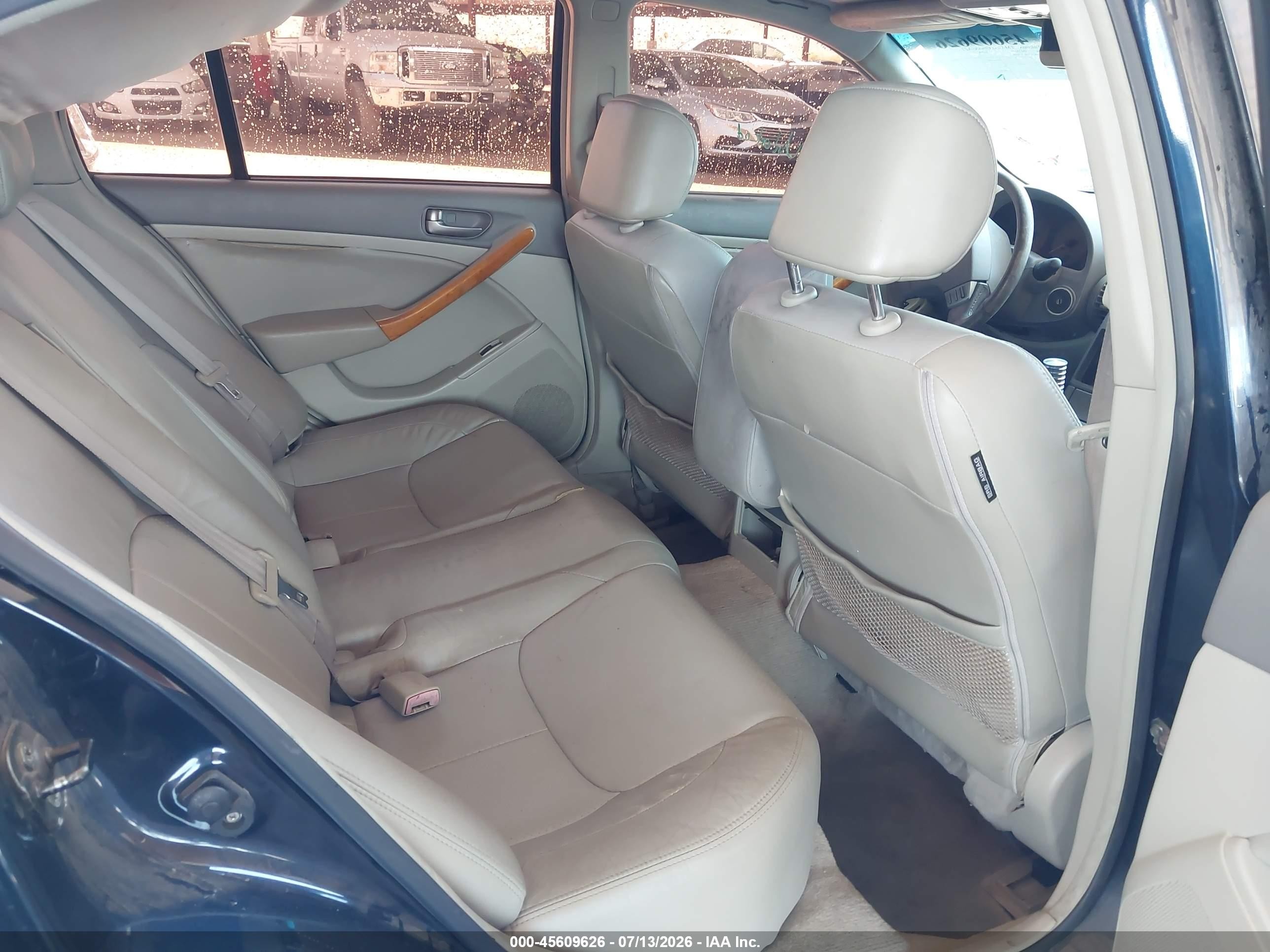 2004 Infiniti G35x   Blue vin: JNKCV51F64M700018