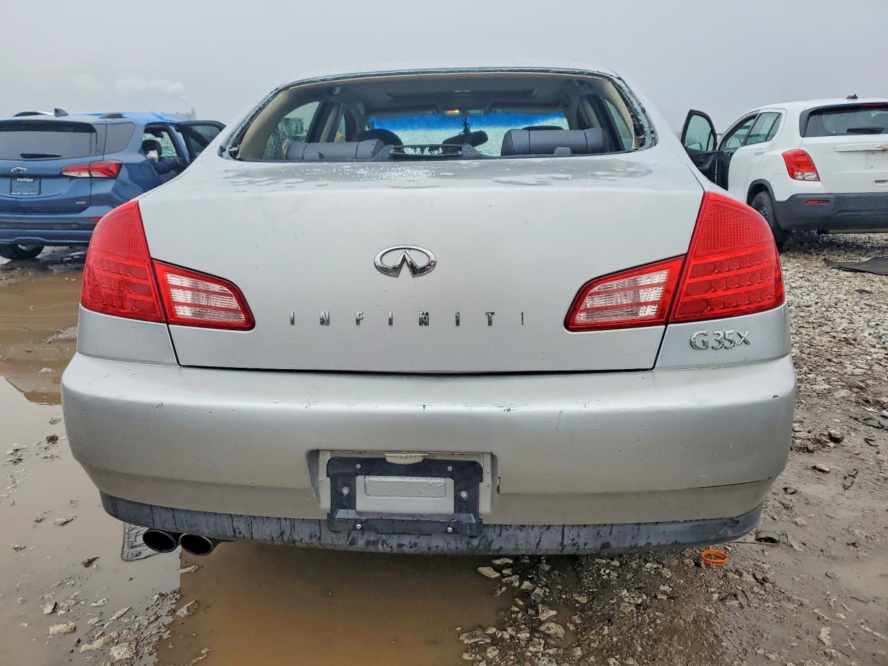 2004 Infiniti G35 Base Silver vin: JNKCV51F74M707530