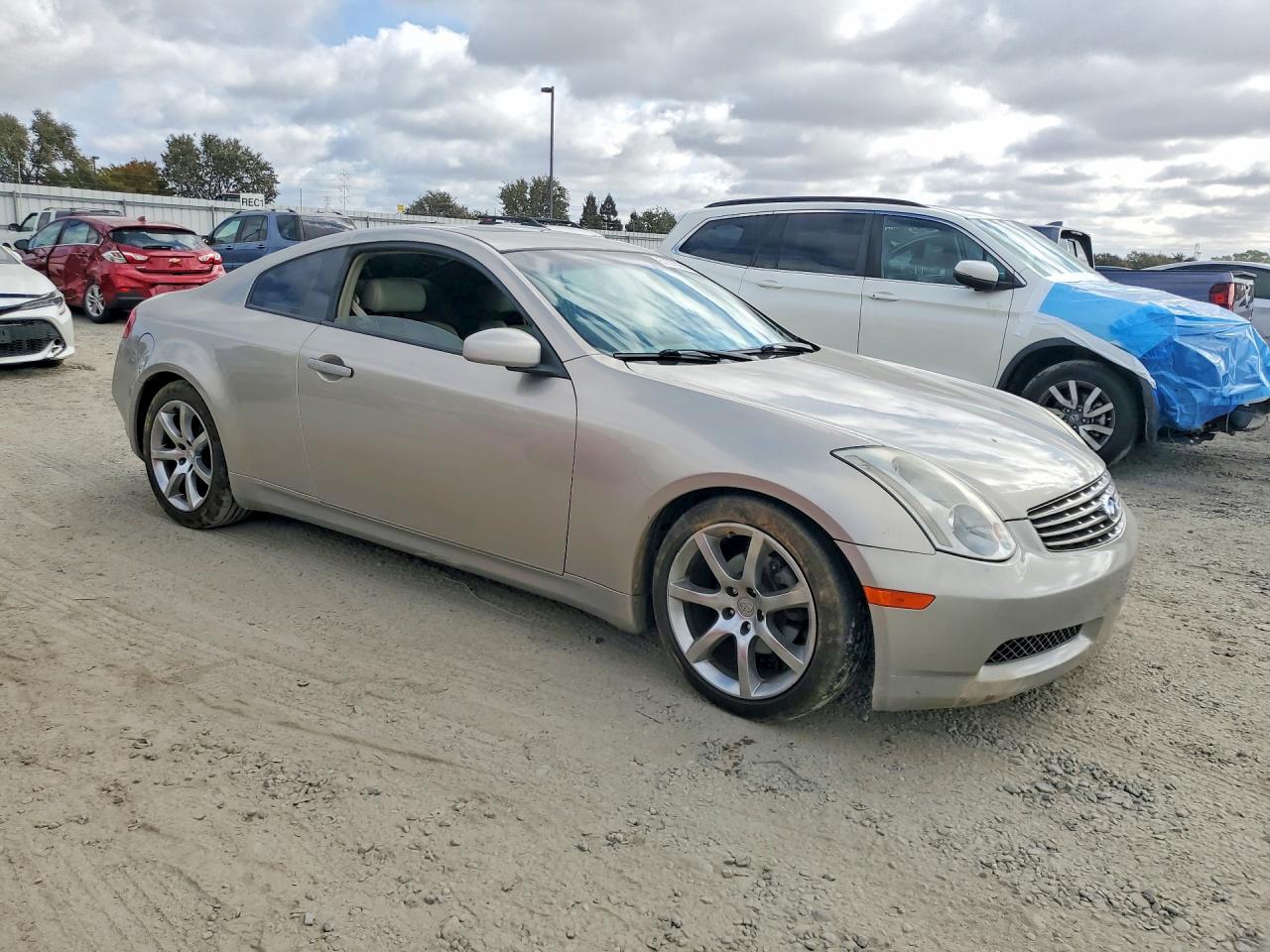 2003 Infiniti G35 Base Tan vin: JNKCV54E53M211515