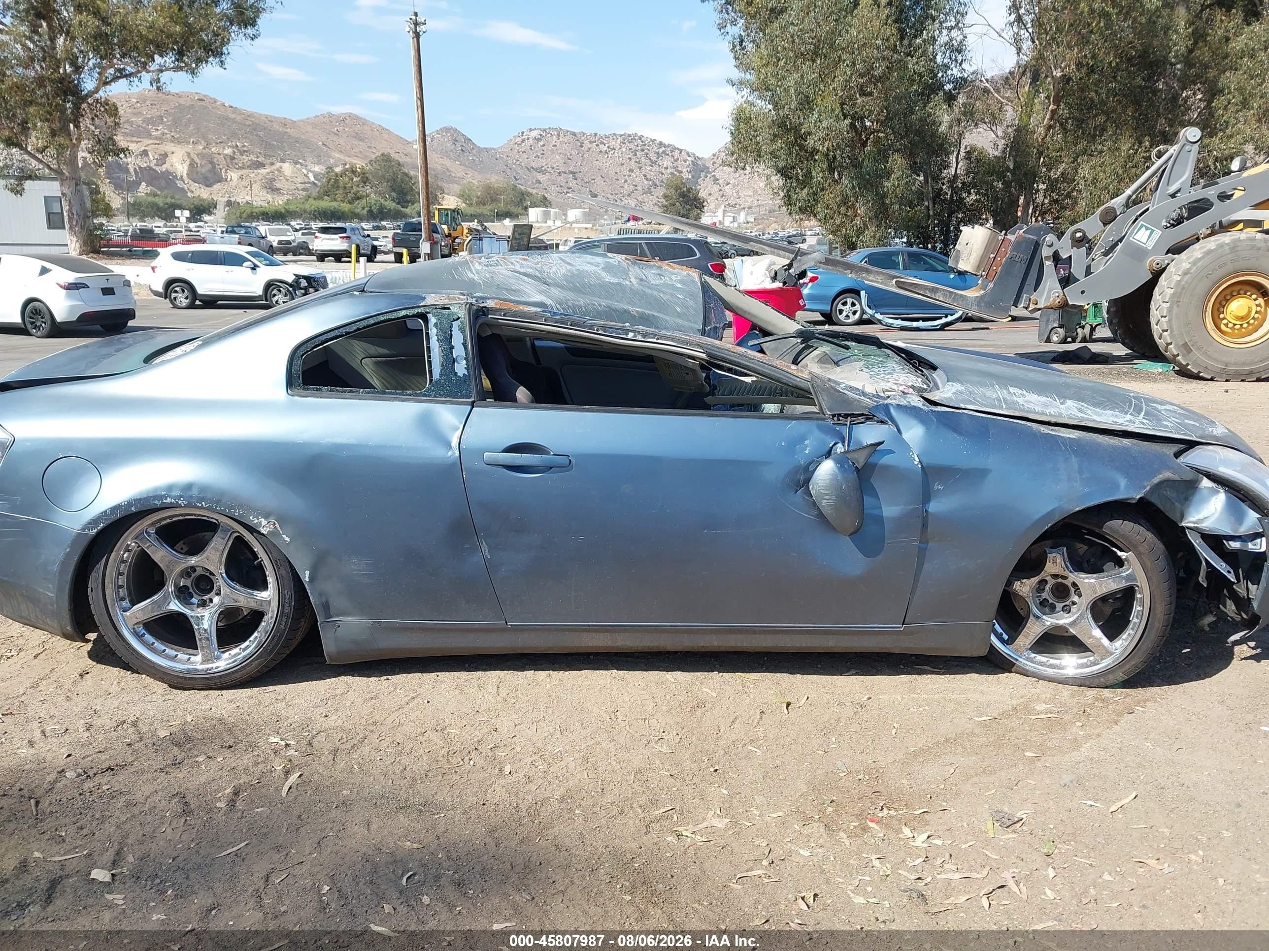 2005 Infiniti G35   Blue vin: JNKCV54E75M407748