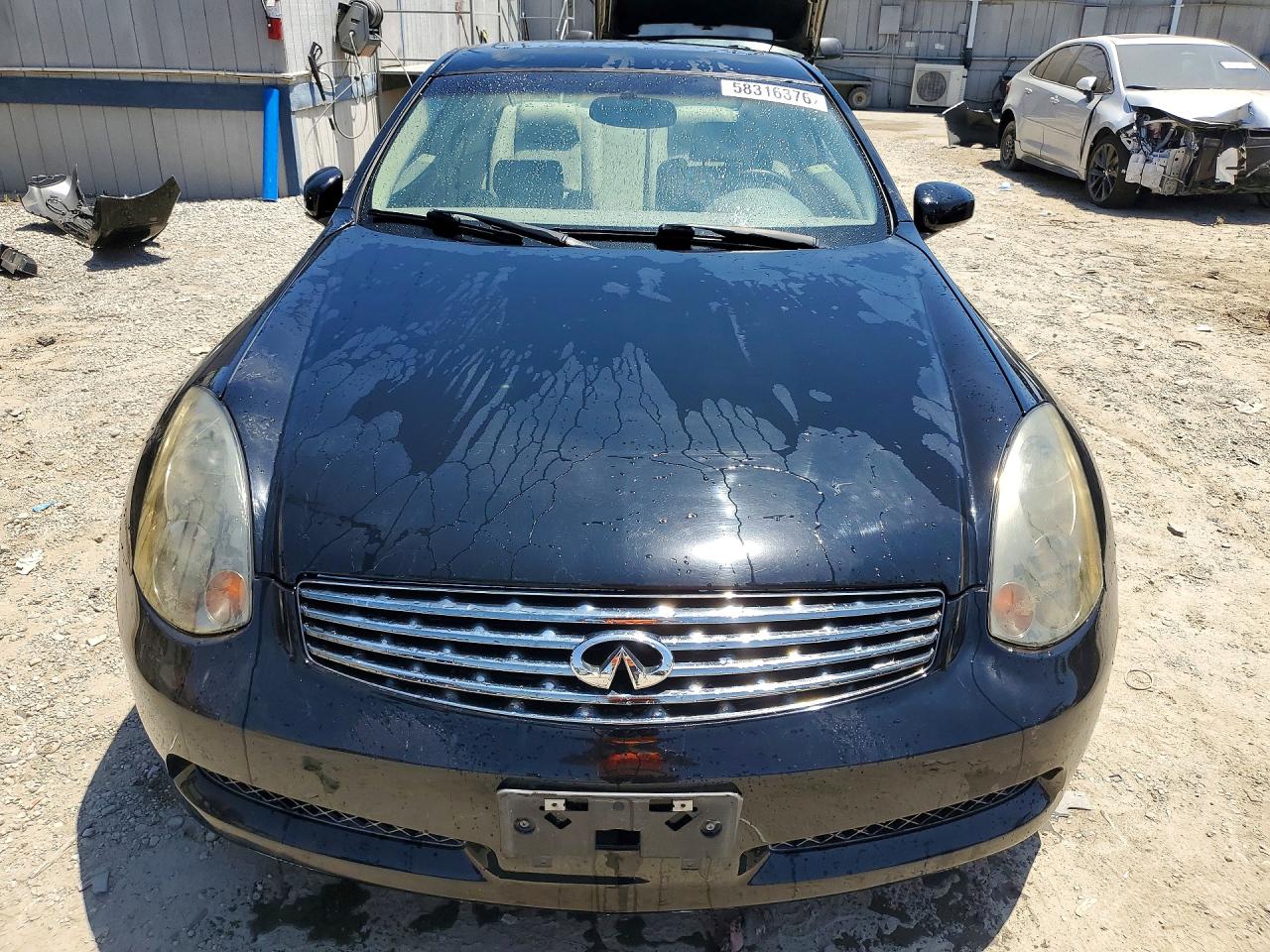 2004 Infiniti G35 Base Black vin: JNKCV54E84M300934