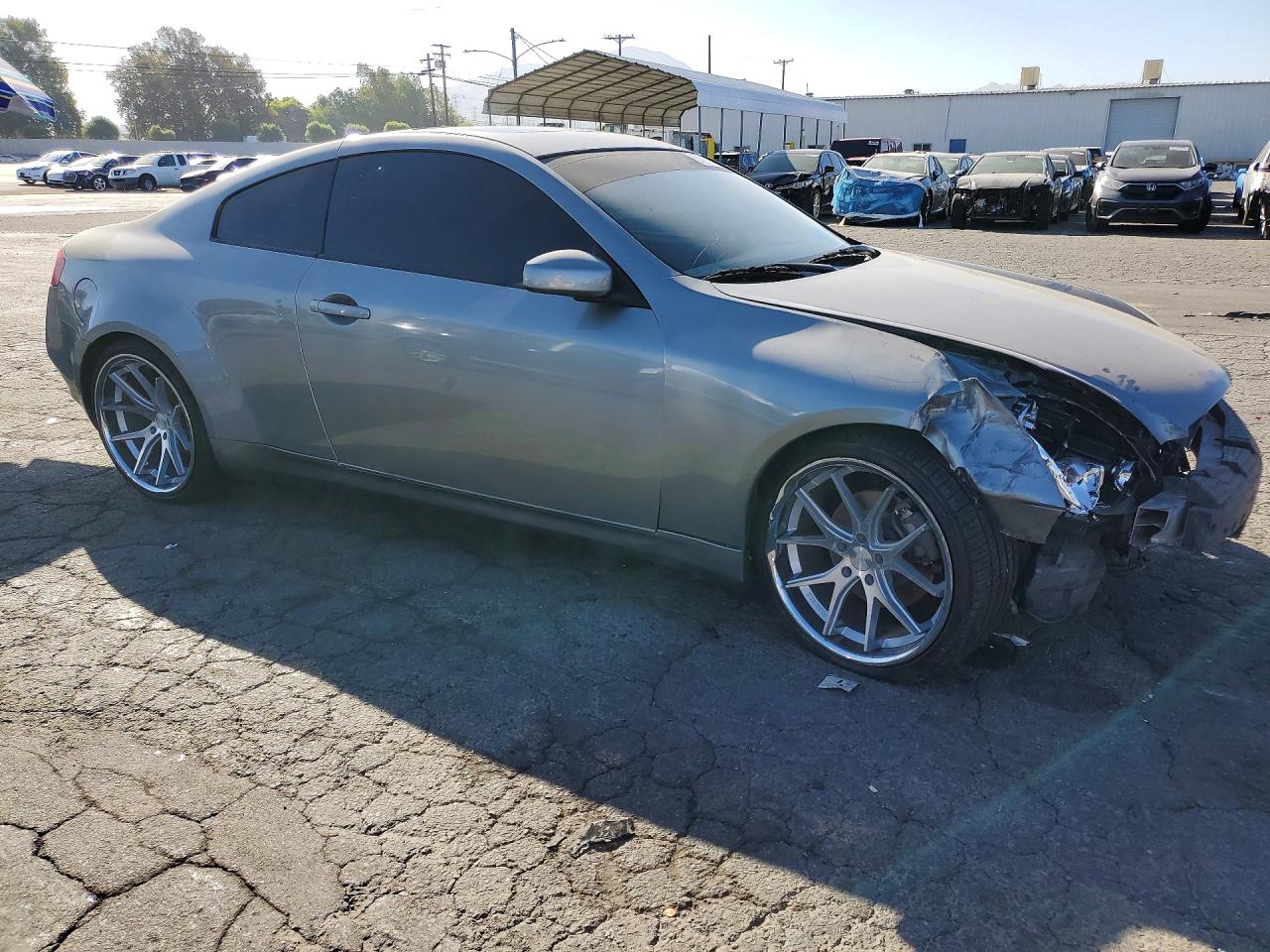 2005 Infiniti G35 Base Серебряный vin: JNKCV54E85M406561