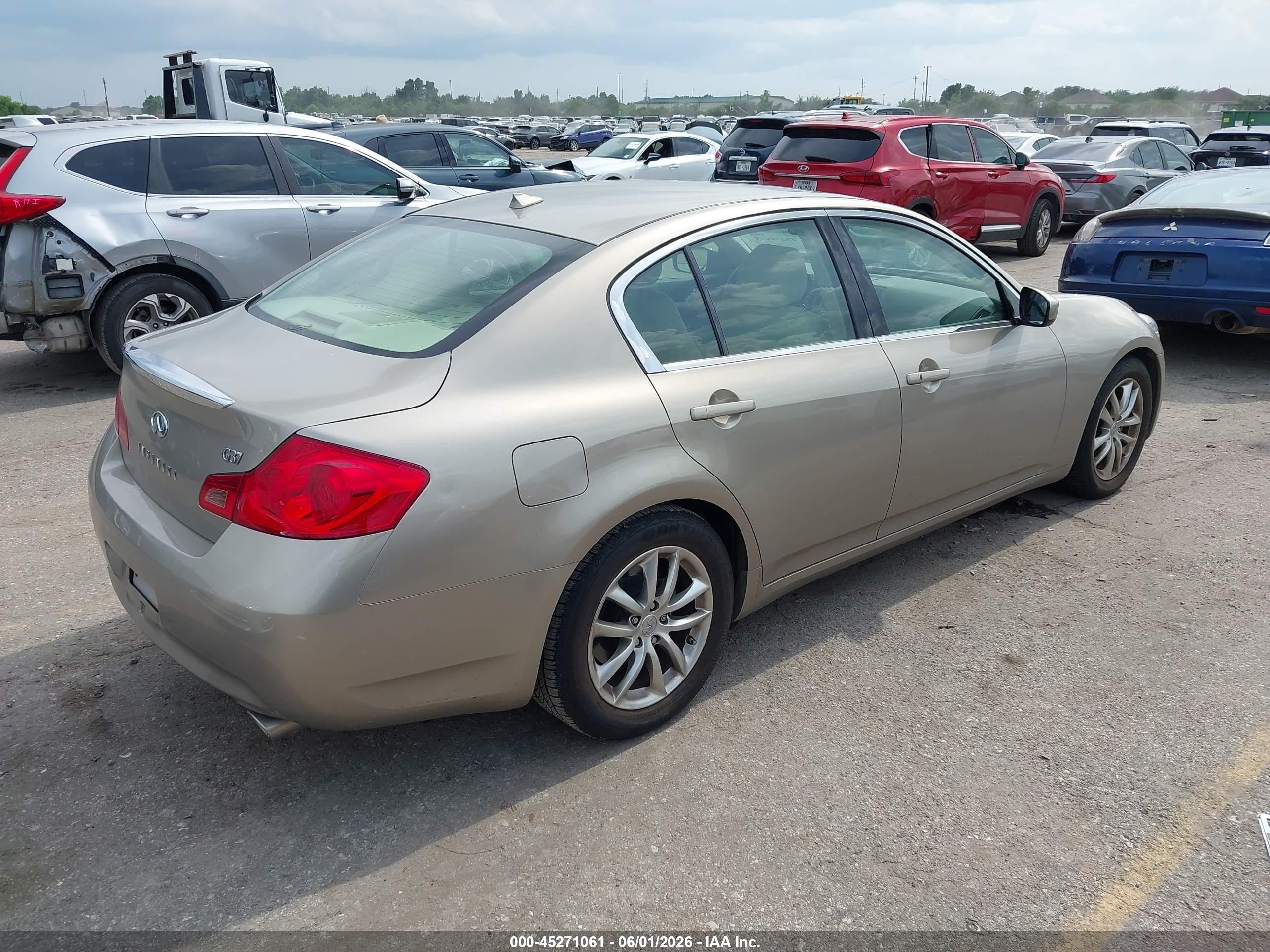 2009 Infiniti G37 Journey Золотой vin: JNKCV61E19M012464