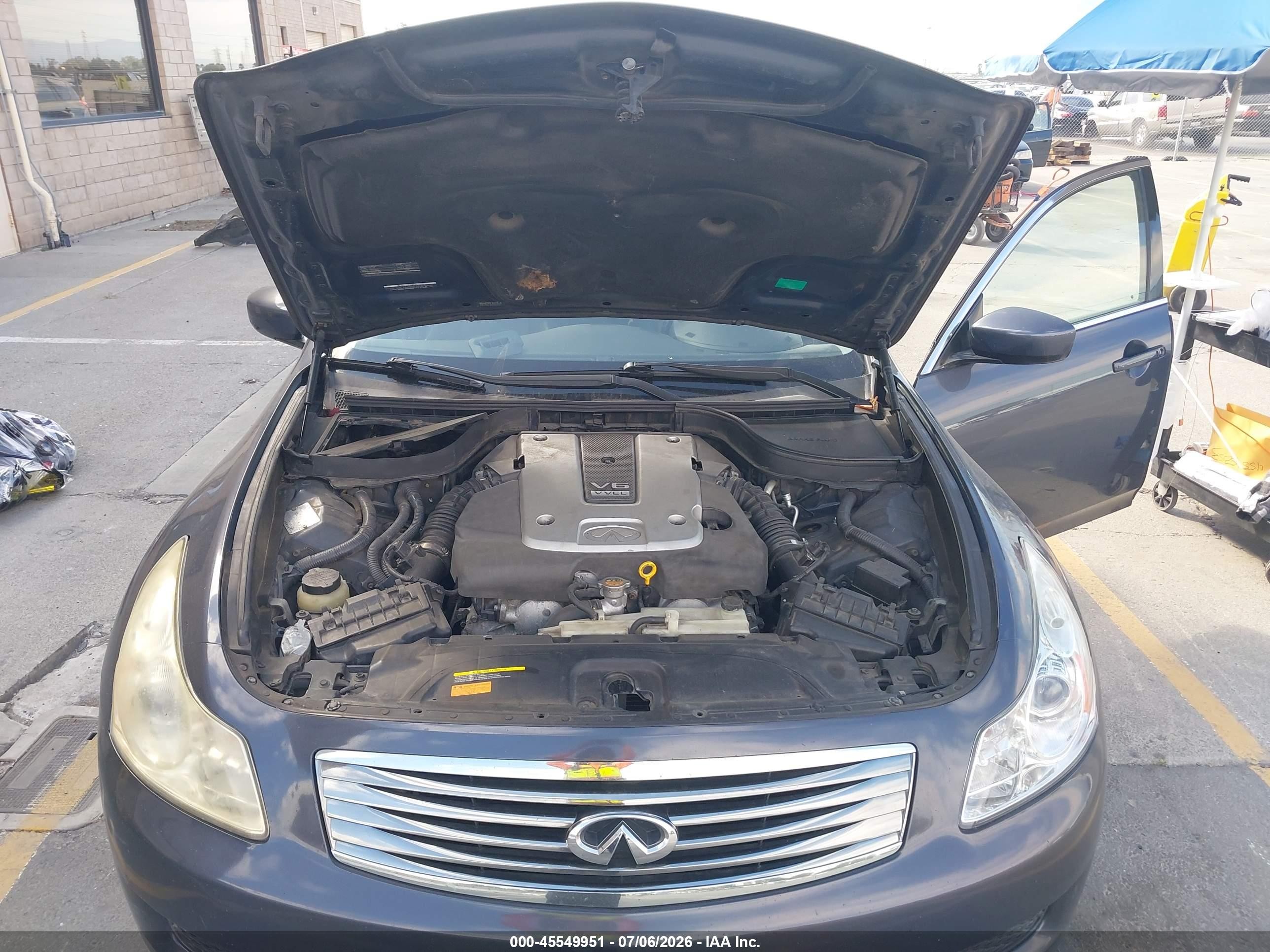 2009 Infiniti G37 Journey Blue vin: JNKCV61E29M309758