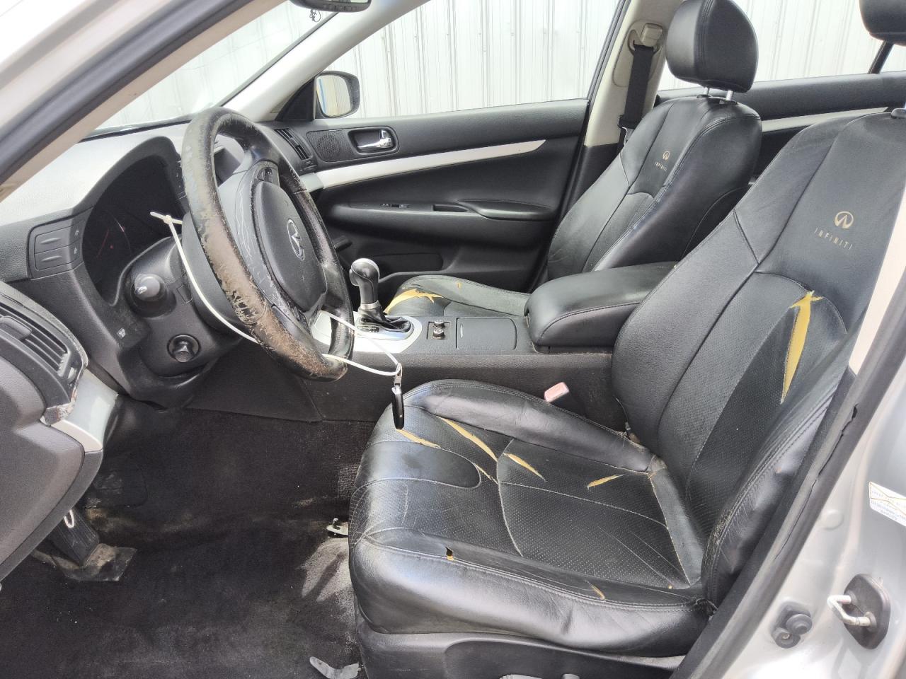 2009 Infiniti G37 Base/journey/sport Silver vin: JNKCV61EX9M011927 Damage: Steering Wheel, Worn, Replacement Required