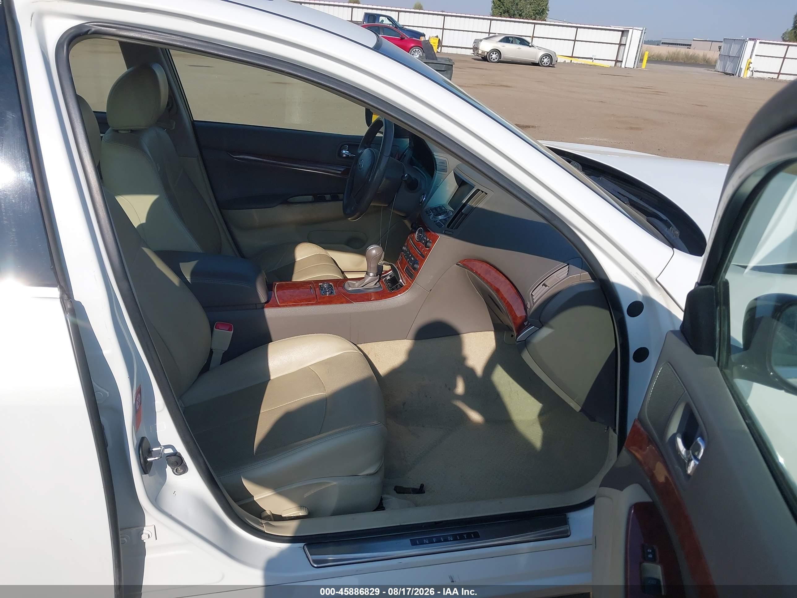 2009 Infiniti G37x   White vin: JNKCV61F09M362631