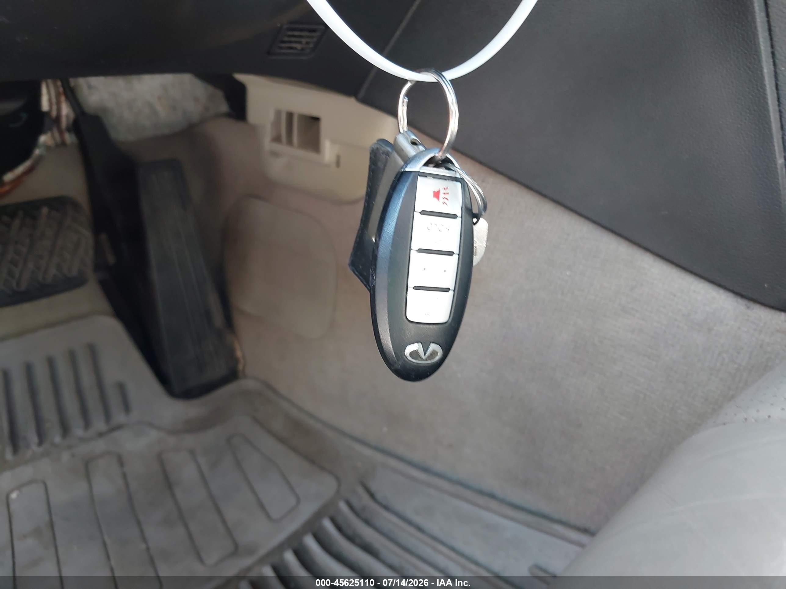 2009 Infiniti G37x   White vin: JNKCV61F19M351377